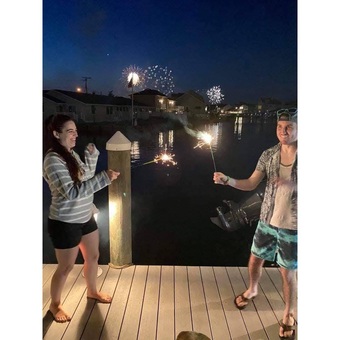 Celebrating 4th of July in Toms River, dancing with sparklers and watching the fireworks
