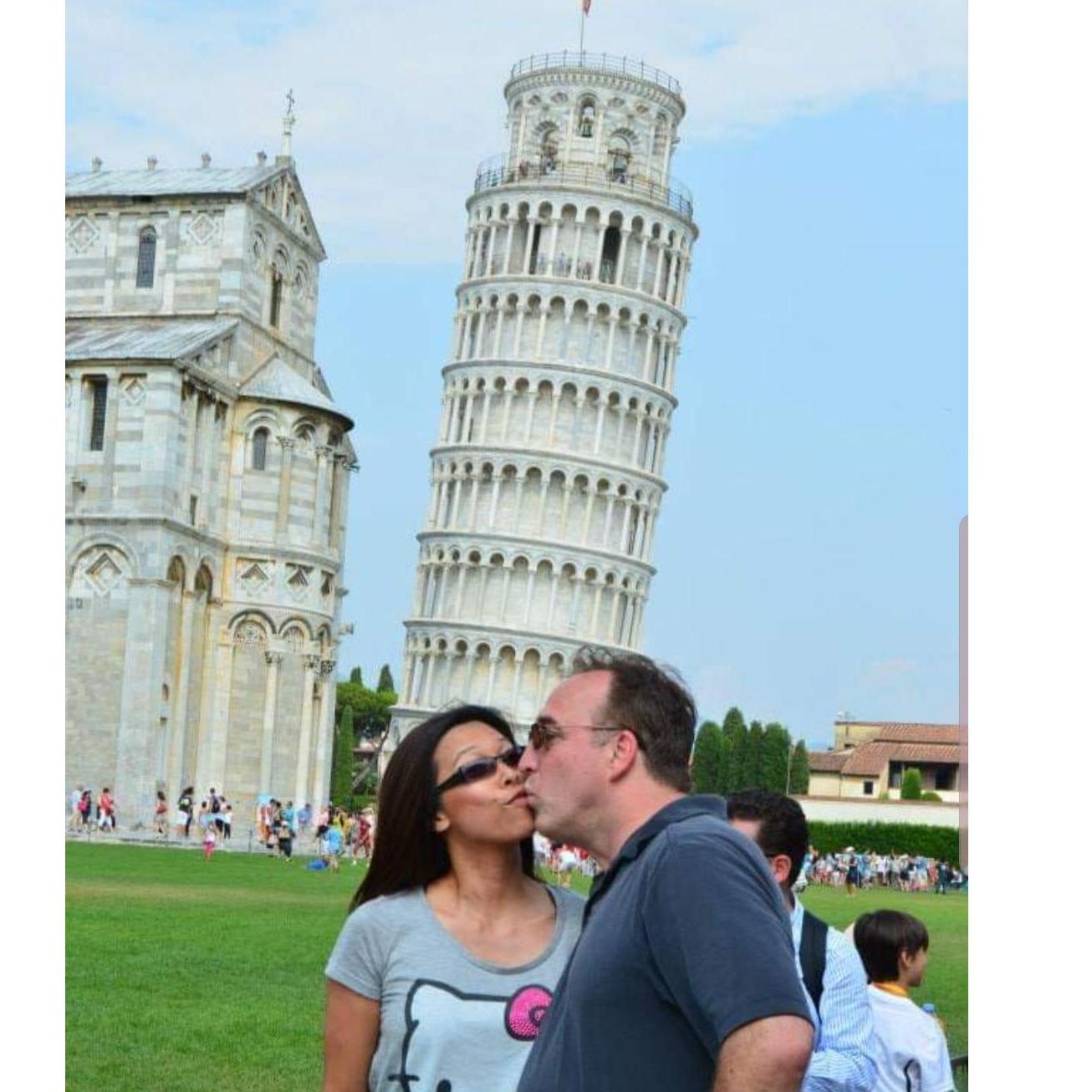 Stealing a kiss by the Tower of Pisa. Italy 2013.