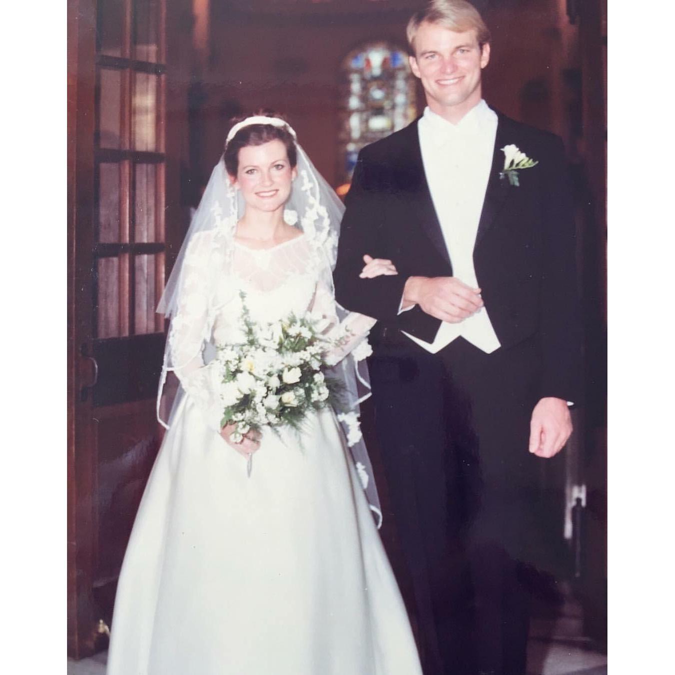 Preston and Laura Hipp on their wedding day at Saint Philip's Church
