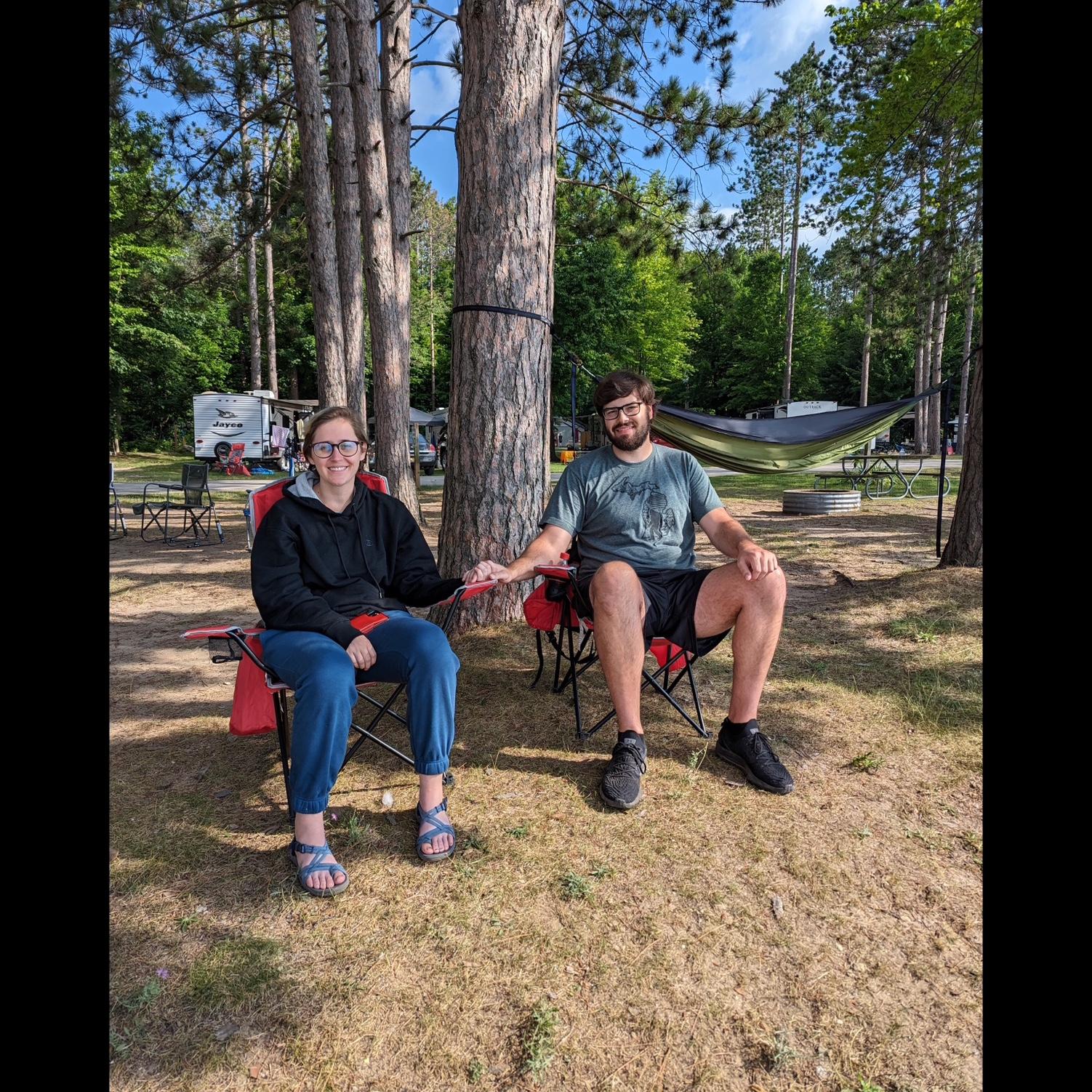 Soaking in the lake at Northern Exposure campground in Mesick, MI one last time before Krista flew back to NC, August 2023