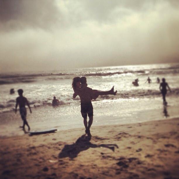 3 year anniversary in Huntington Beach, Ca. Looks romantic, but Tyler was actually throwing Sage in the ocean!