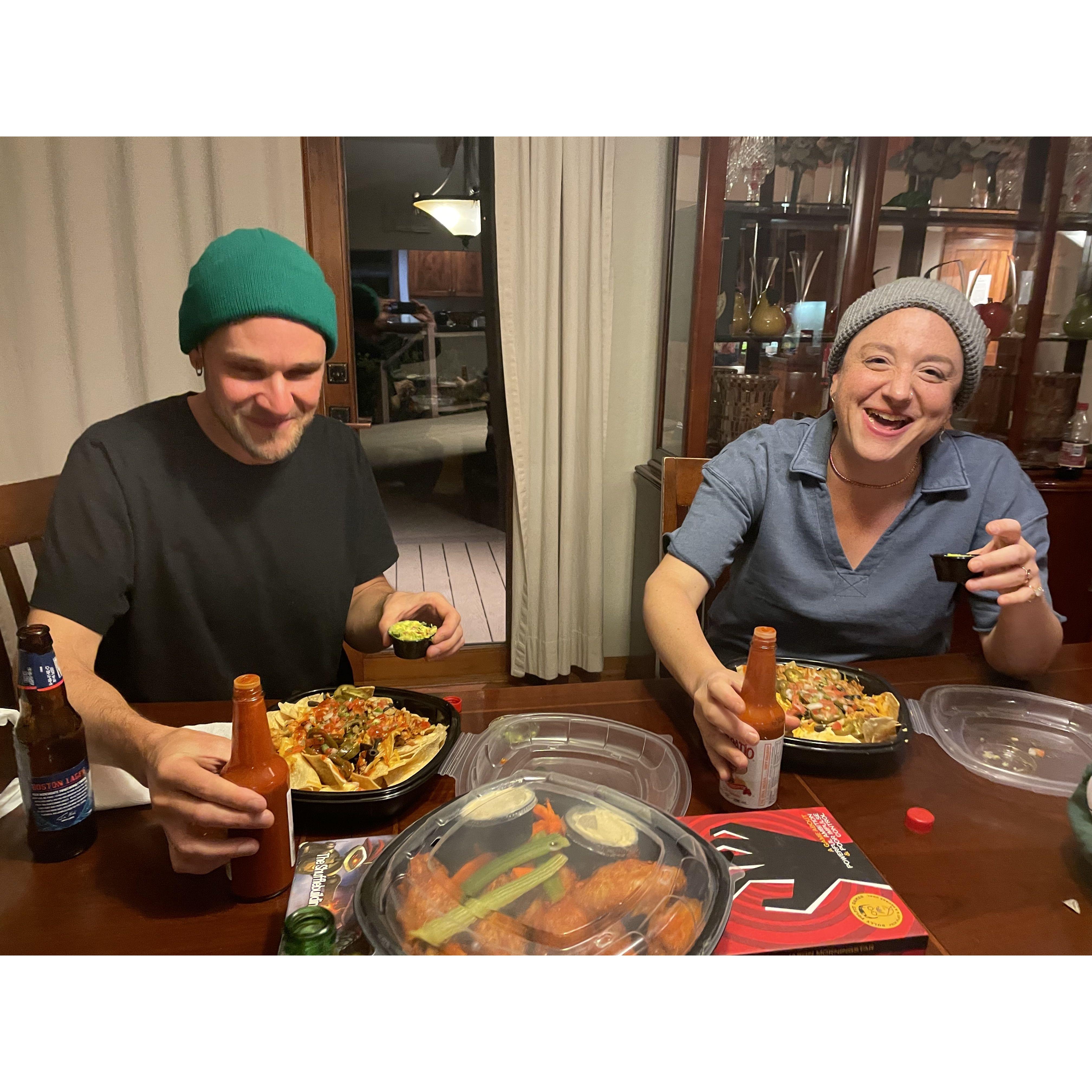 Augy and jenn, chowing down on nachos, and in complete sync.