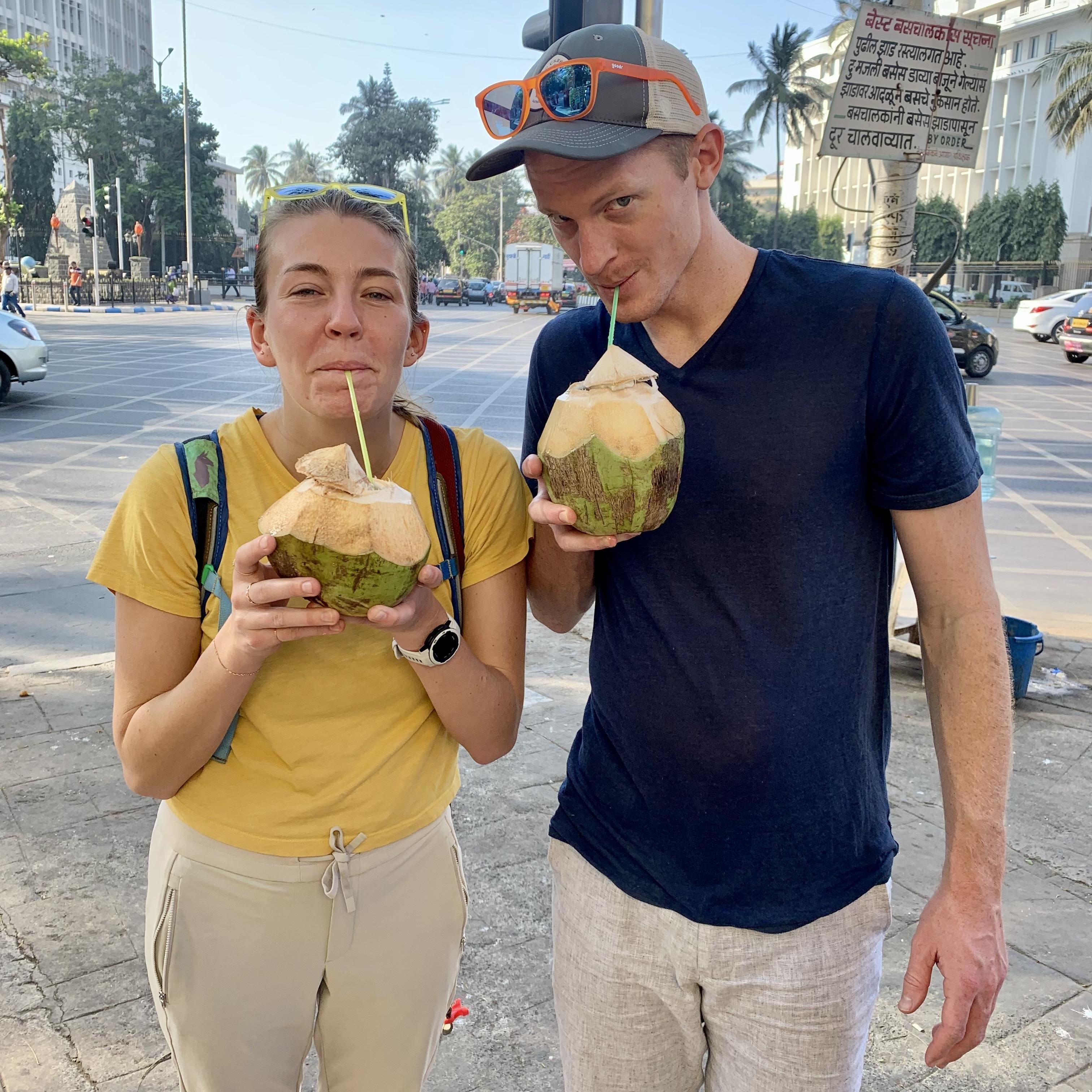 Drinking coconut water on a trip to Mumbai, India to celebrate a friend's wedding.