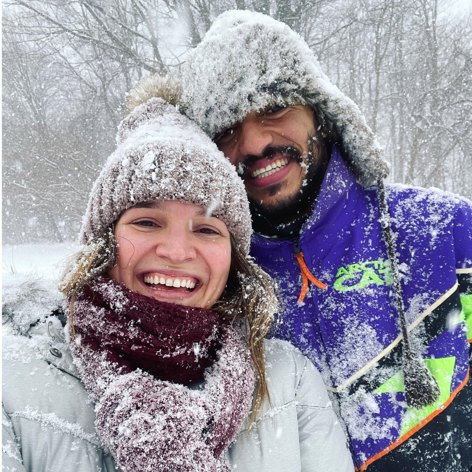 Our first snow storm in Michigan! Morgan borrowed some clothes from my dad's closet (from the 90s, we're pretty sure!).