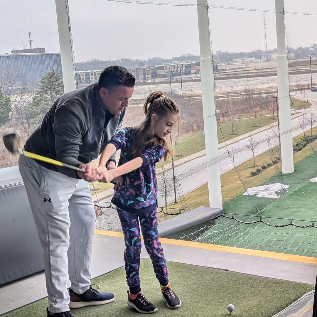 Teaching Cayden golf