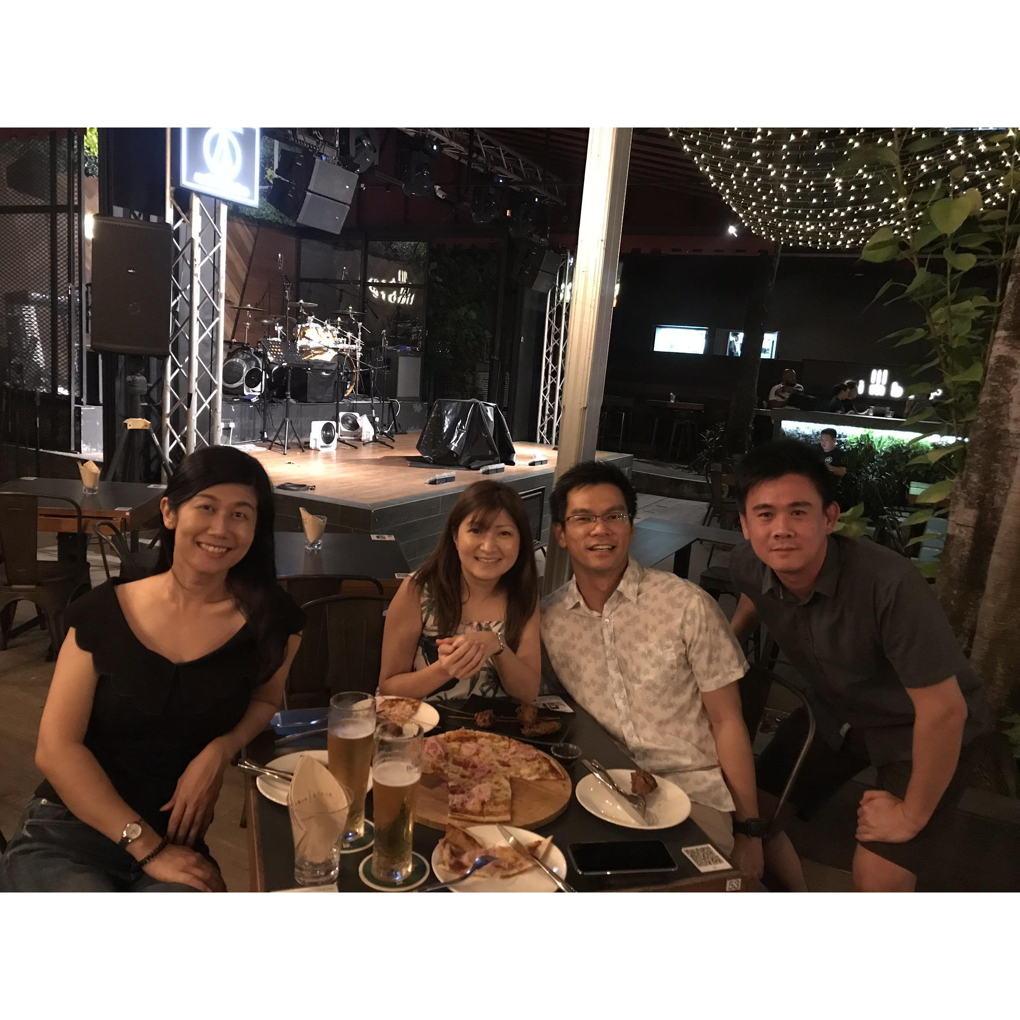 With his buddies from secondary school