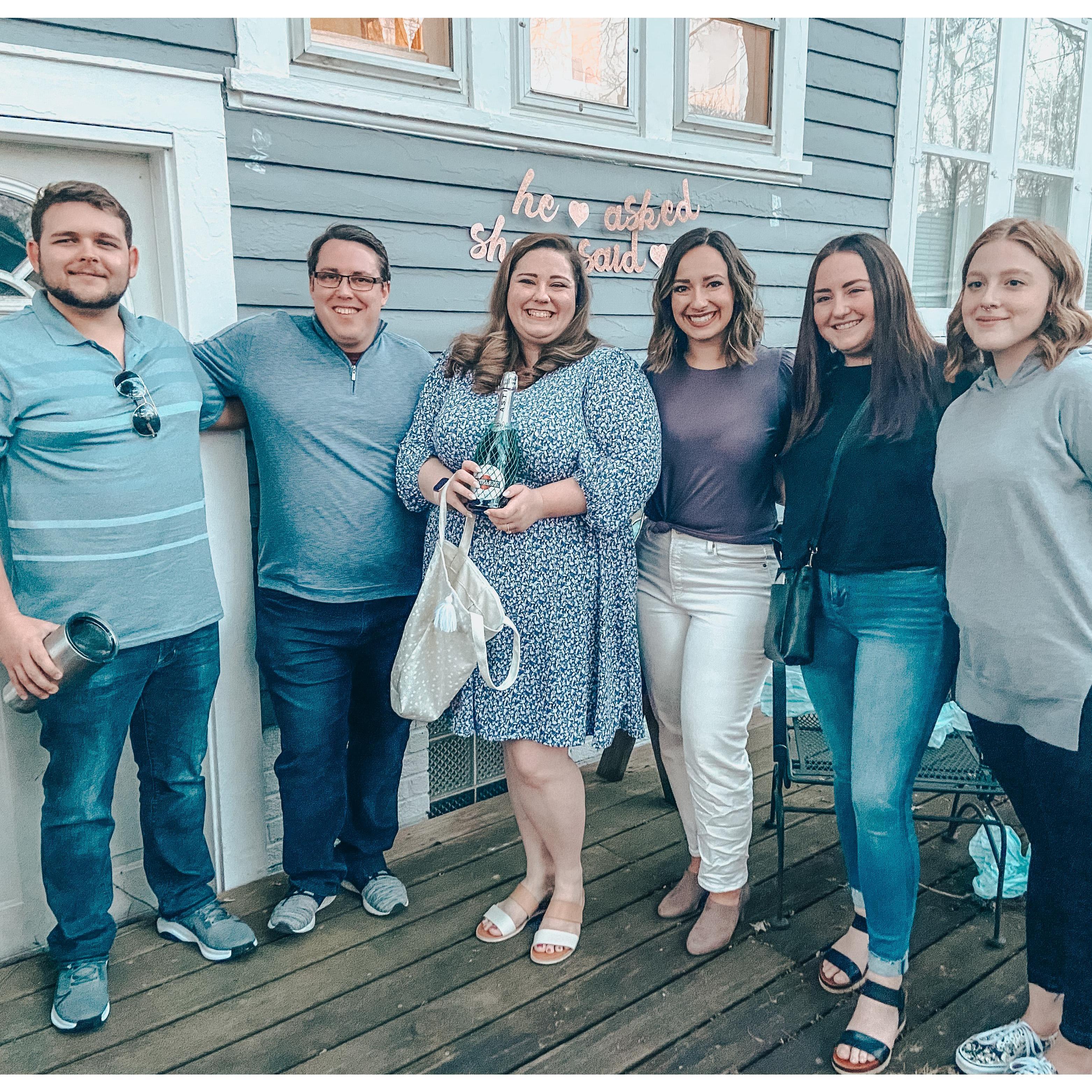 Celebrating at our engagement party with Sarah's coworkers!