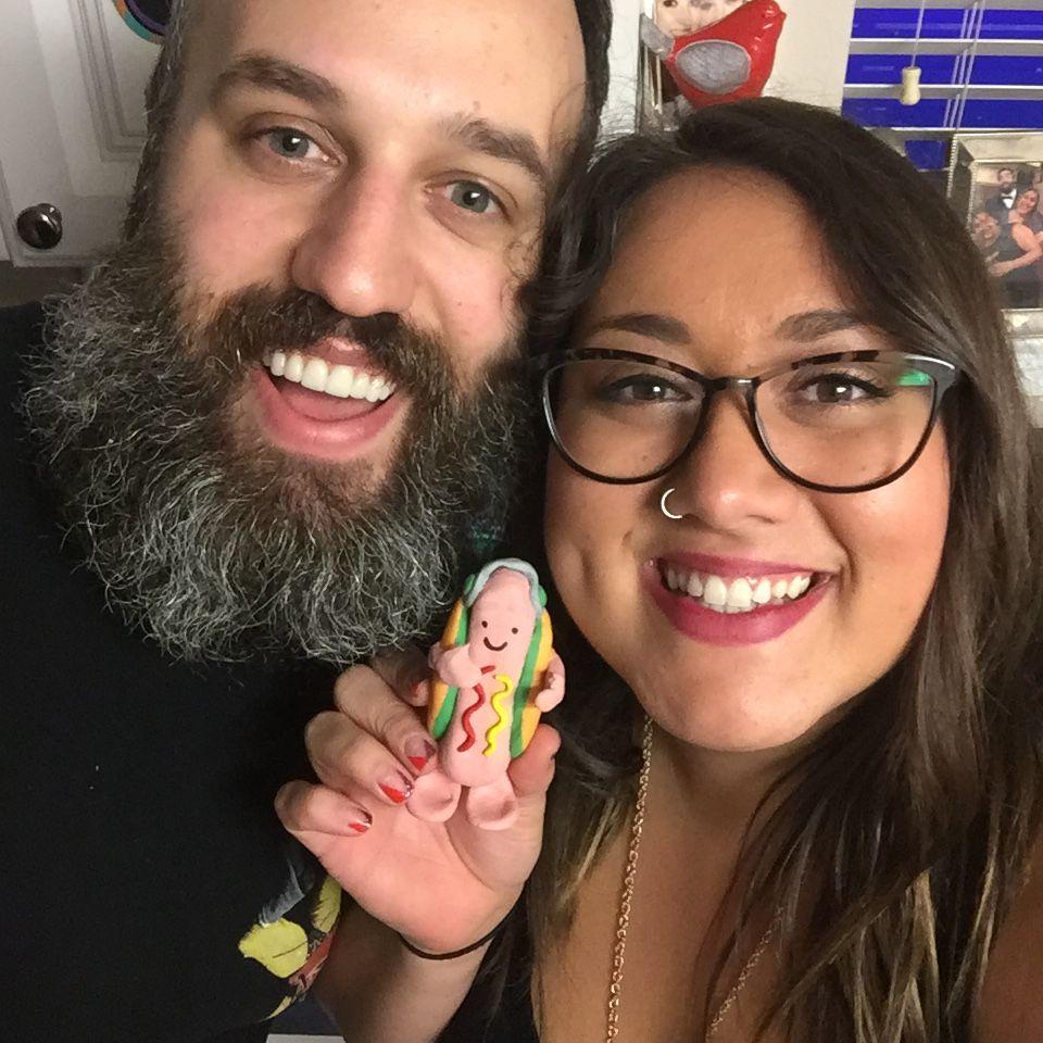 Taking a picture with the clay "Hot Dog Man" statue Alyssa made for Andrew