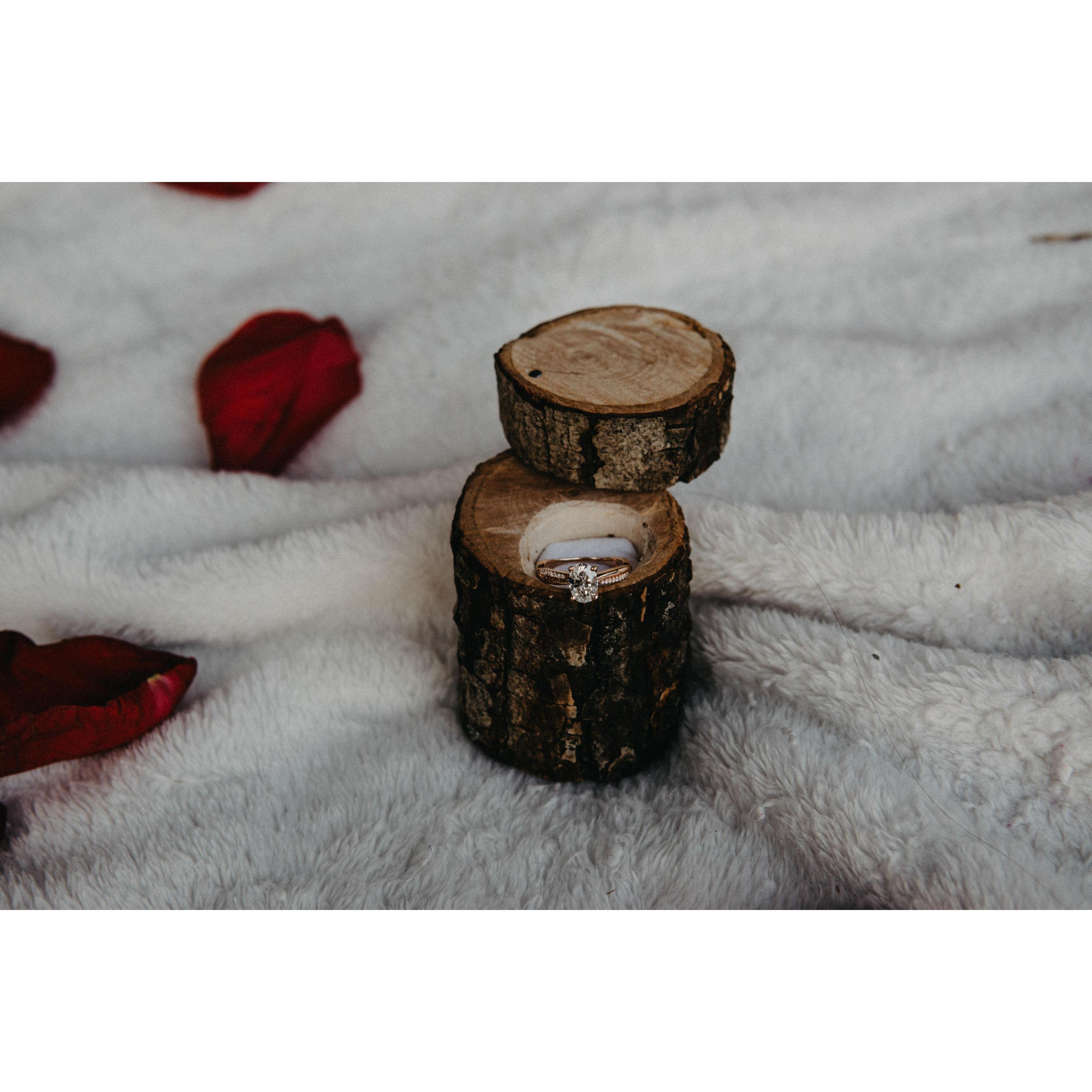 A close up of the ring in Charlie's priceless handmade ring box