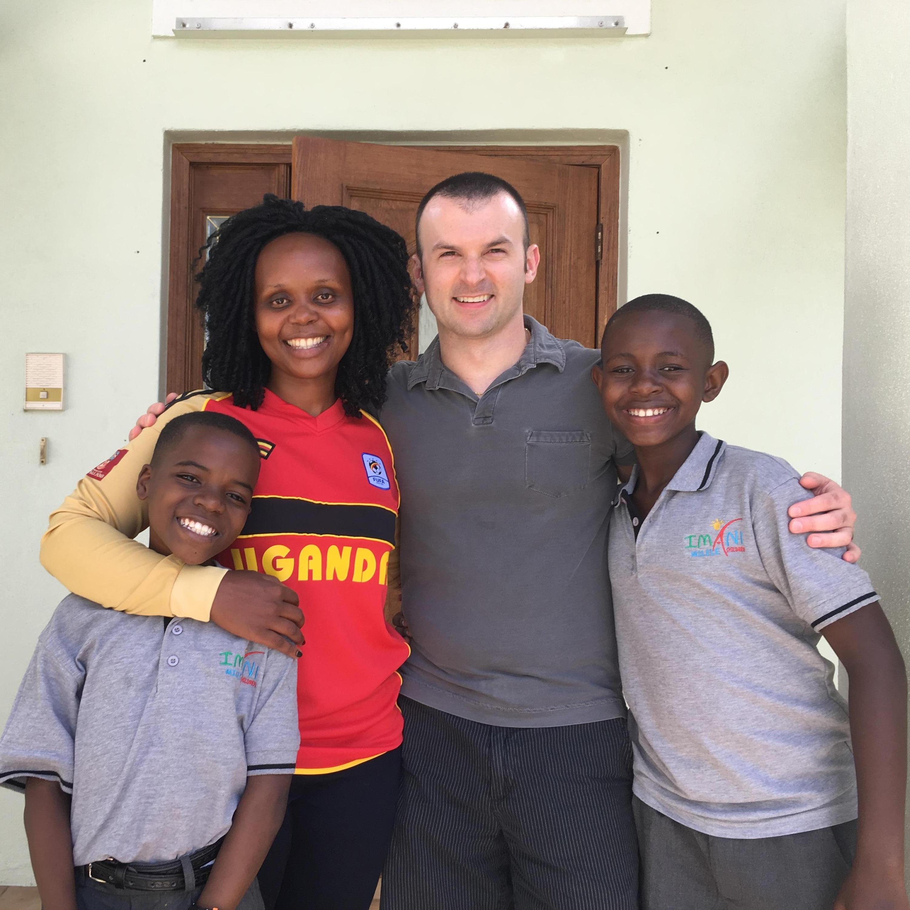 Kemi and Eric with two of "our" many kids: John Lutaya and Aldrine Ssembatya, while in Sebastian, FL, April 2018