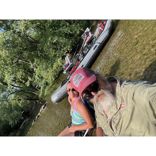 A midday break to soak in the rays on our first raft voyage, 2024