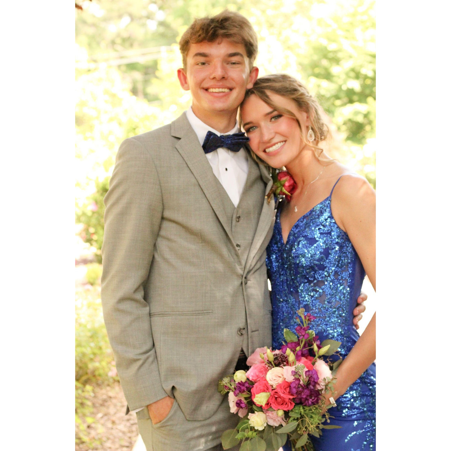 And then there was Kaylee's senior prom, not to mention that Jay knocked his two front teeth out less than a week before this photo was taken.