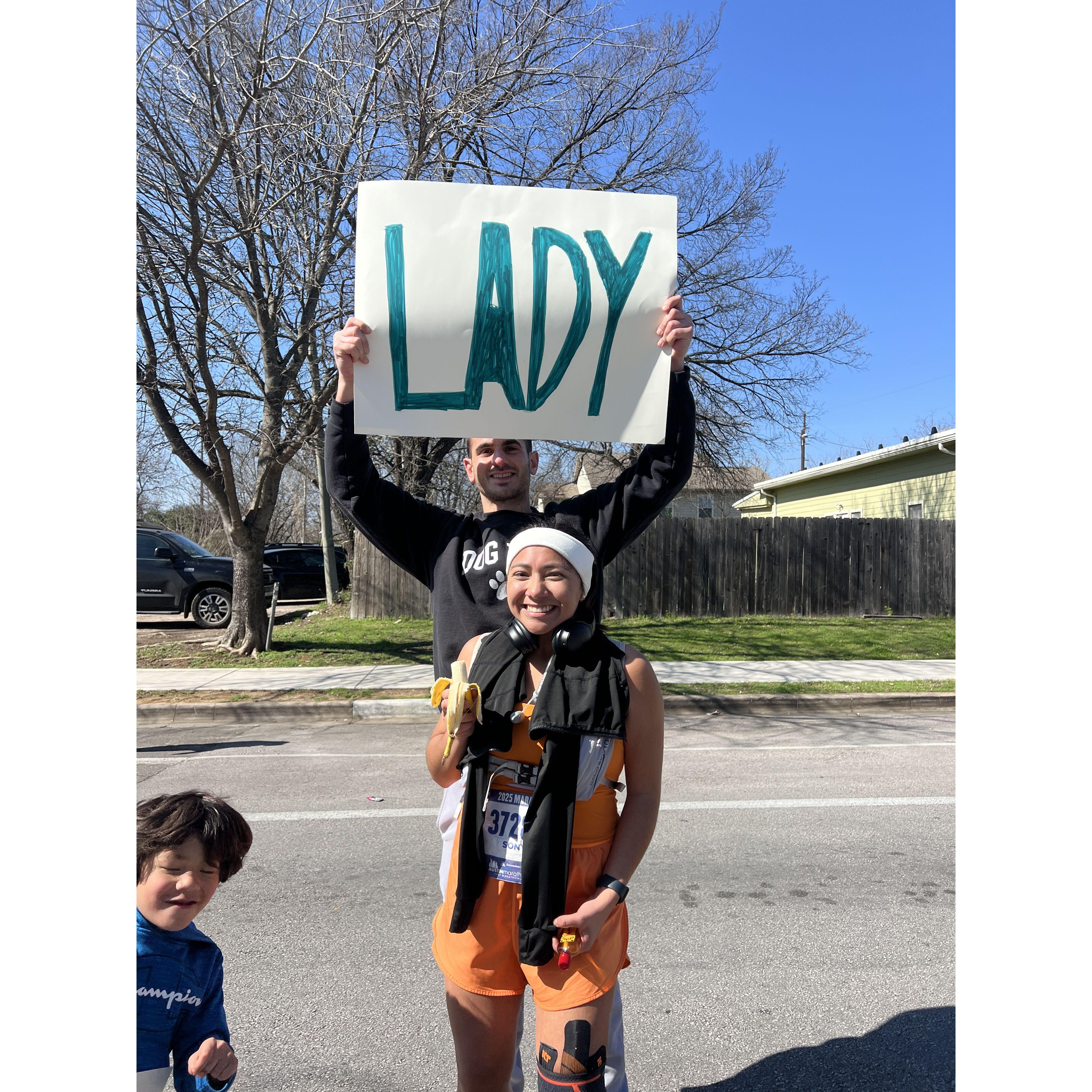 During Sonya's First Marathon. Bryce didn't know what to write on a poster so, he just wrote what he always calls her. "Lady"
