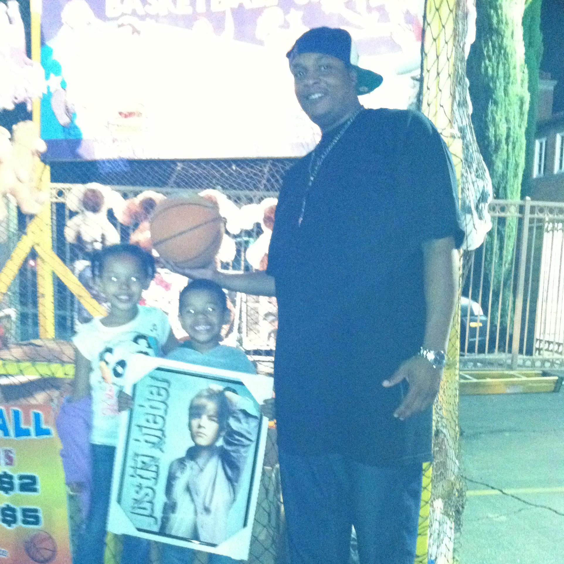 He hit the shot!! A prized Justin Bieber picture, won by Marcus at a carnival basketball game. It hung in their room for years.