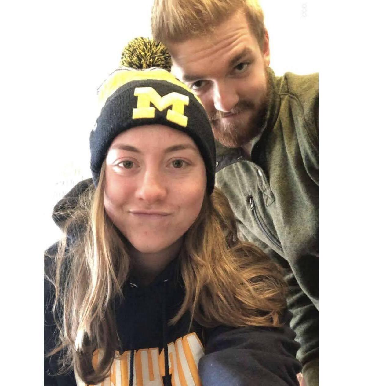 Soon after we started dating, OSU played Michigan in the big game. The loser had to wear the other team's apparel for the BIG10 Championship the following week. Kylie is eager to see James in Scarlet.