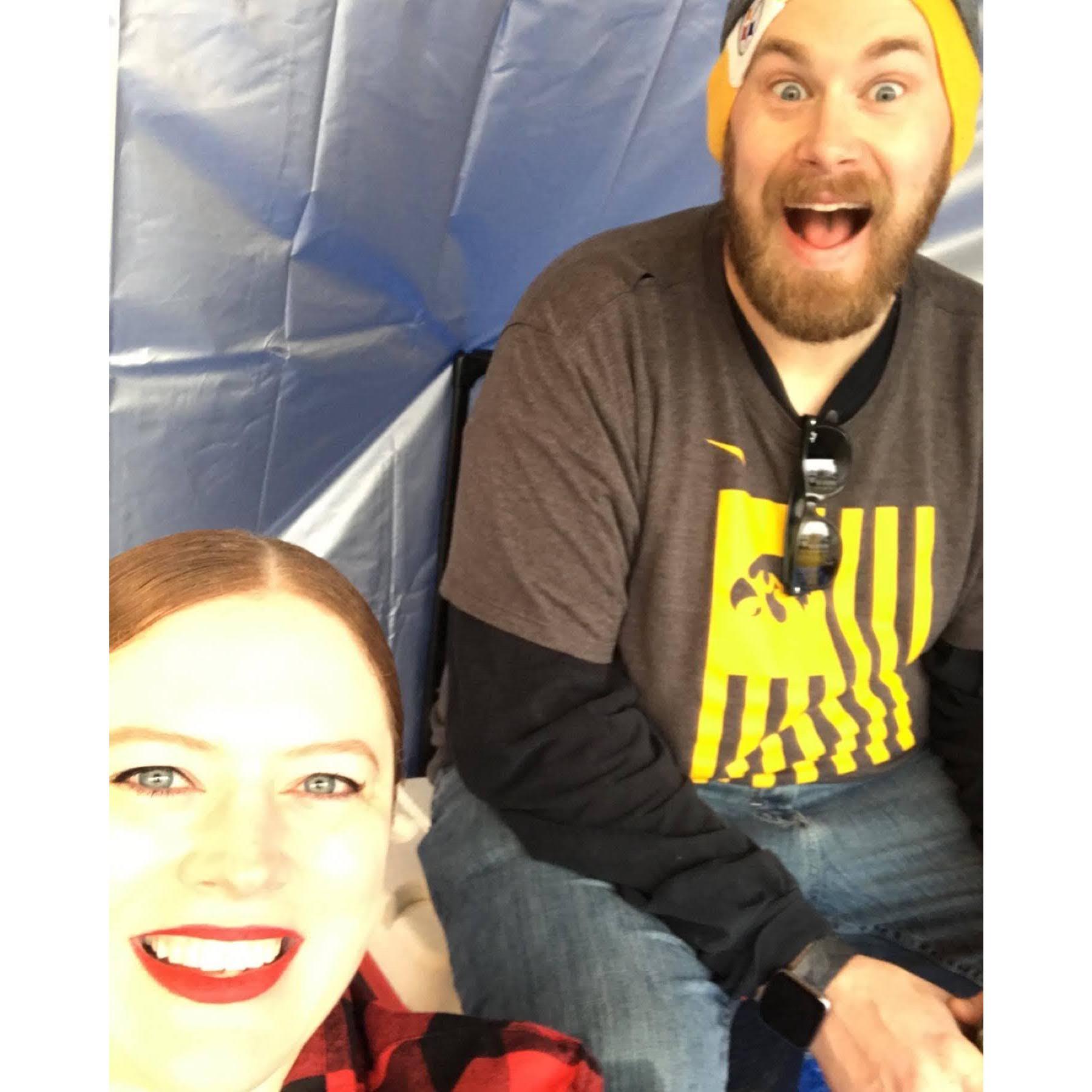 Star-crossed lovers at a Nebraska-Iowa game. (Leah doesn't want to talk about the record.)