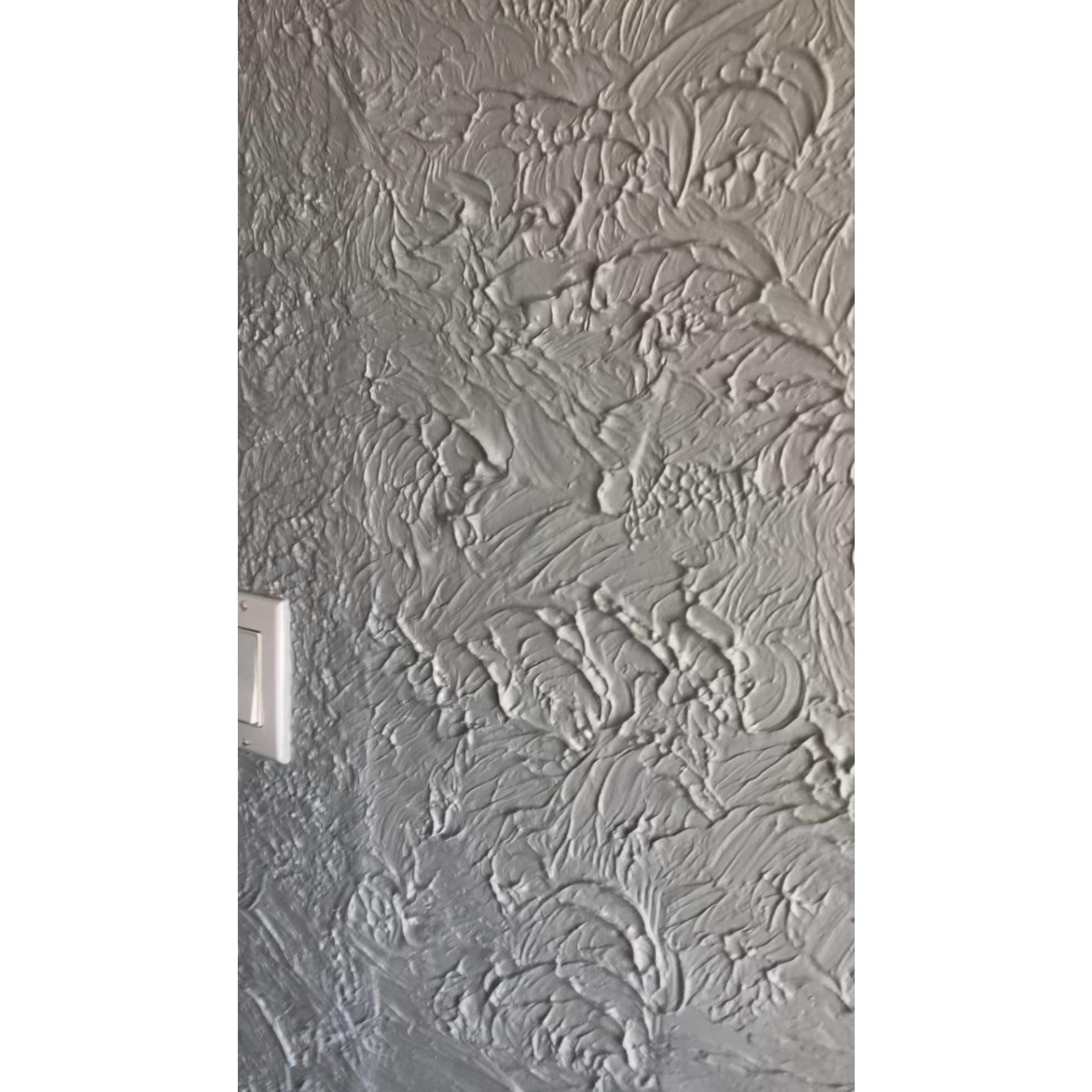 That wall texture though.... The entire entryway was stuccoed in this heavy whip-cream-looking texture. You could not even touch it in some areas without cutting yourself!