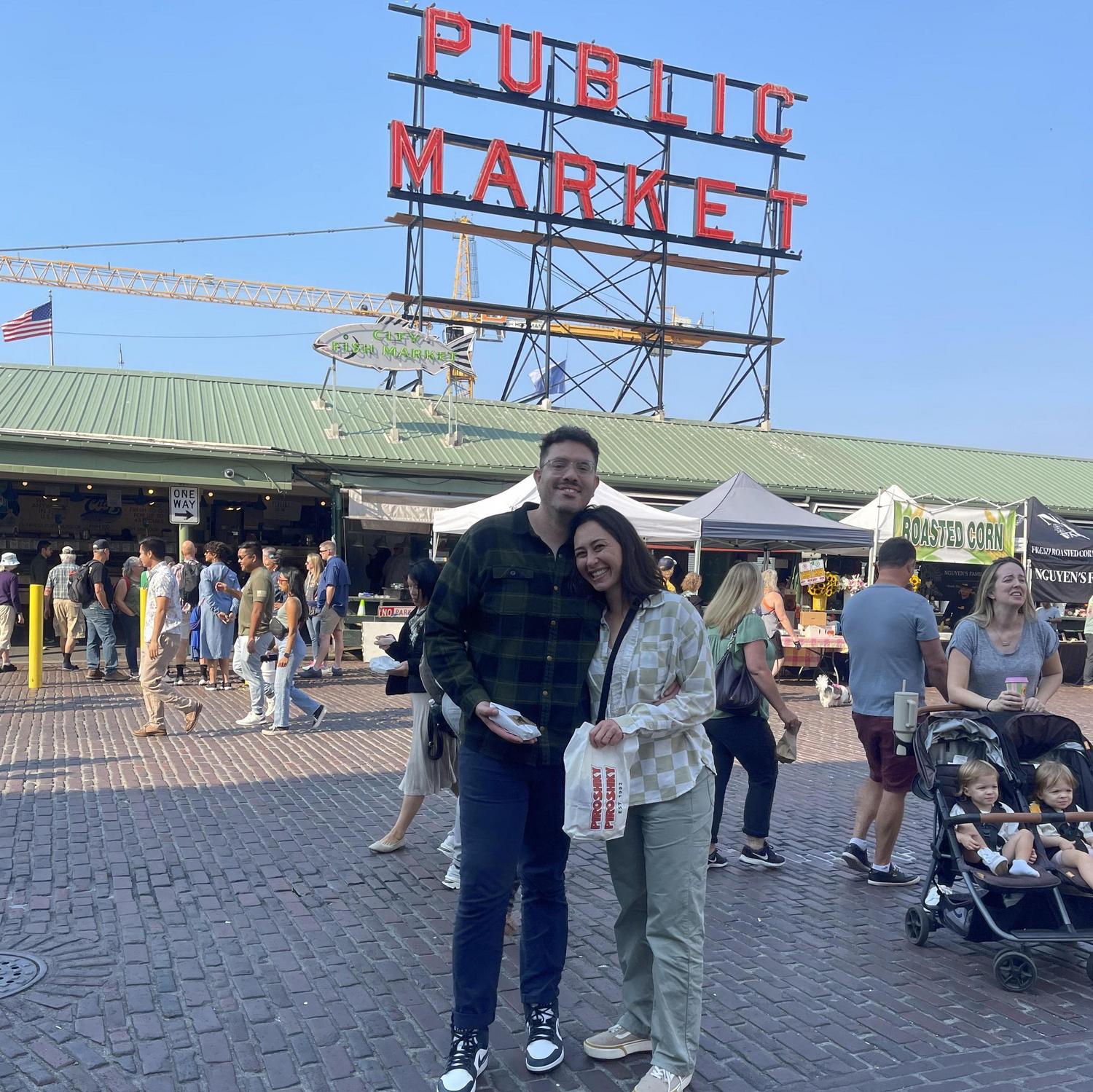Enjoying Beecher's grilled cheese and Piroshky Piroshky in Seattle sun