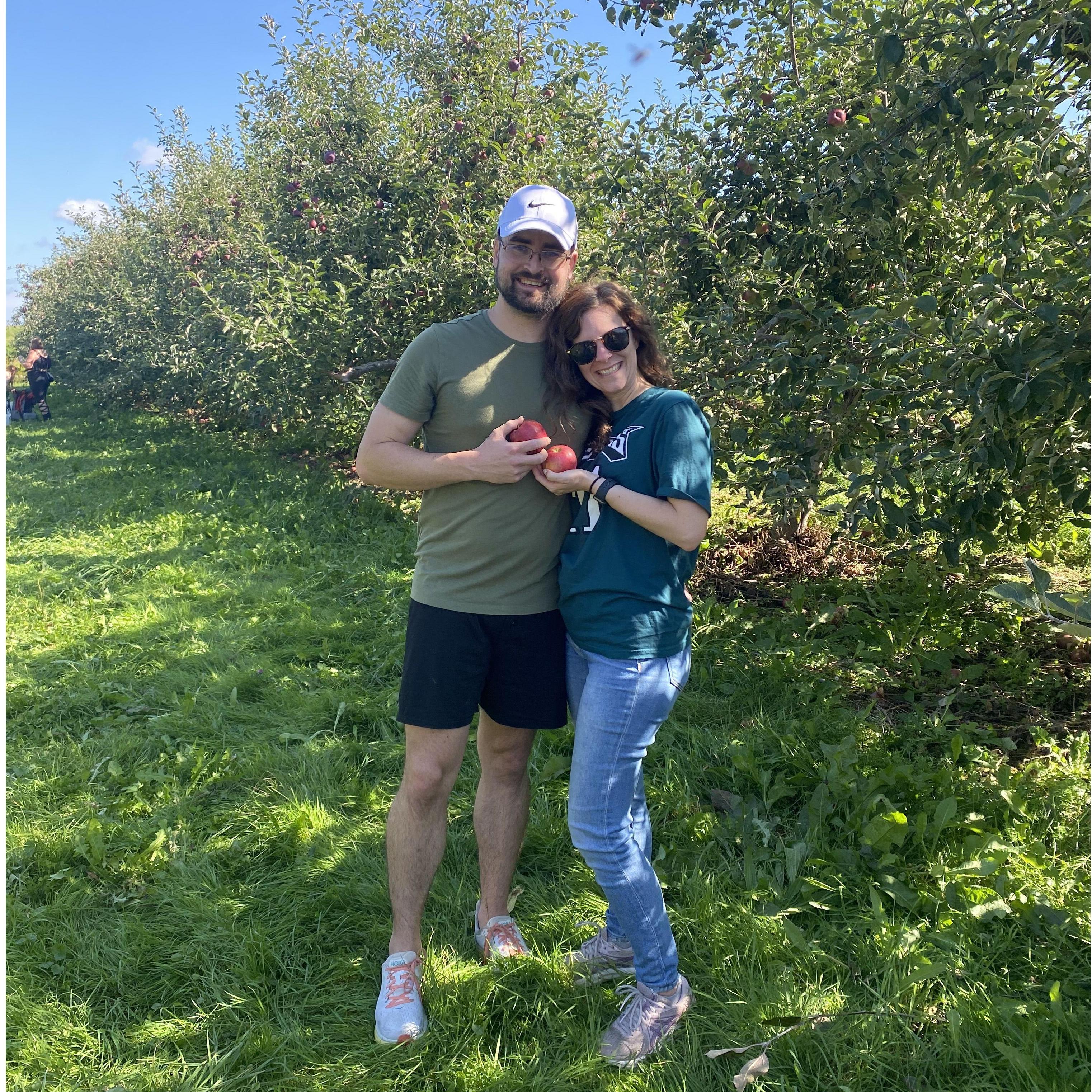 Marie and Austin apple picking at 1911.