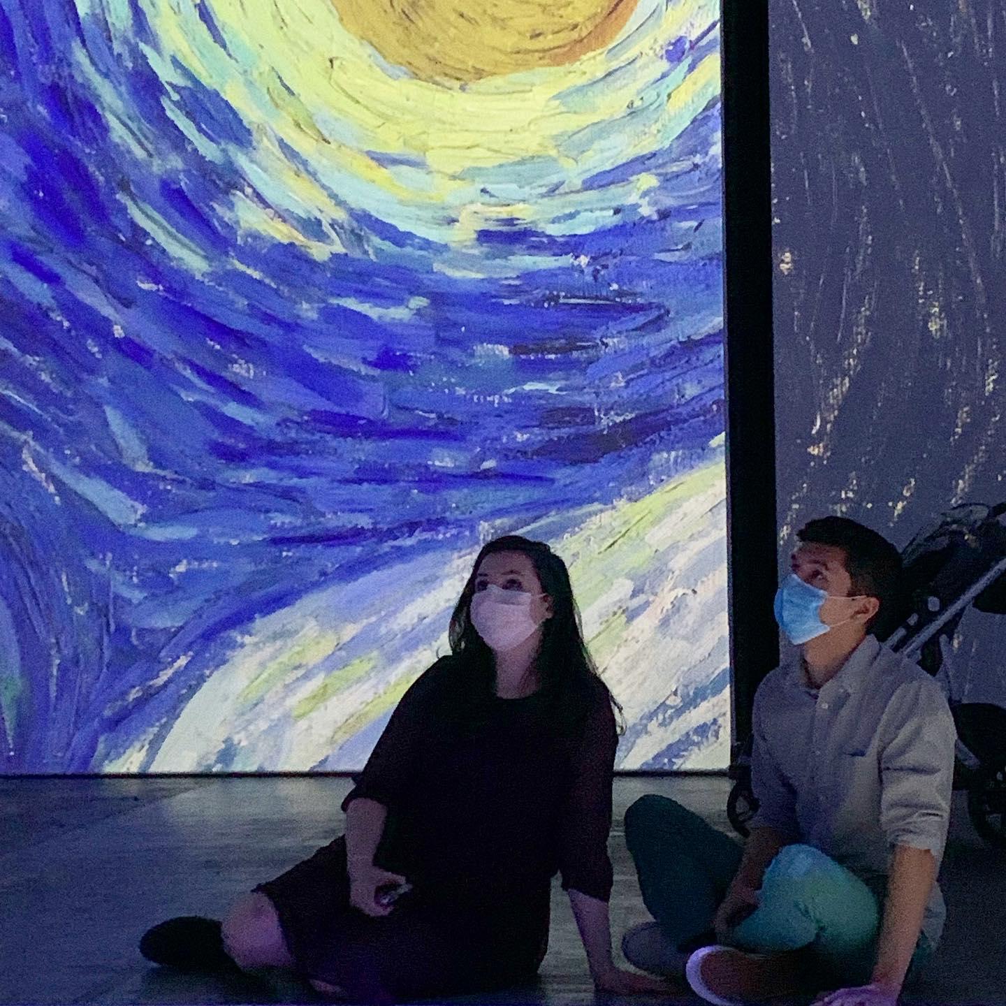 Maid of Honor Cassandra snapped this candid of us at an exhibit for our favorite artist