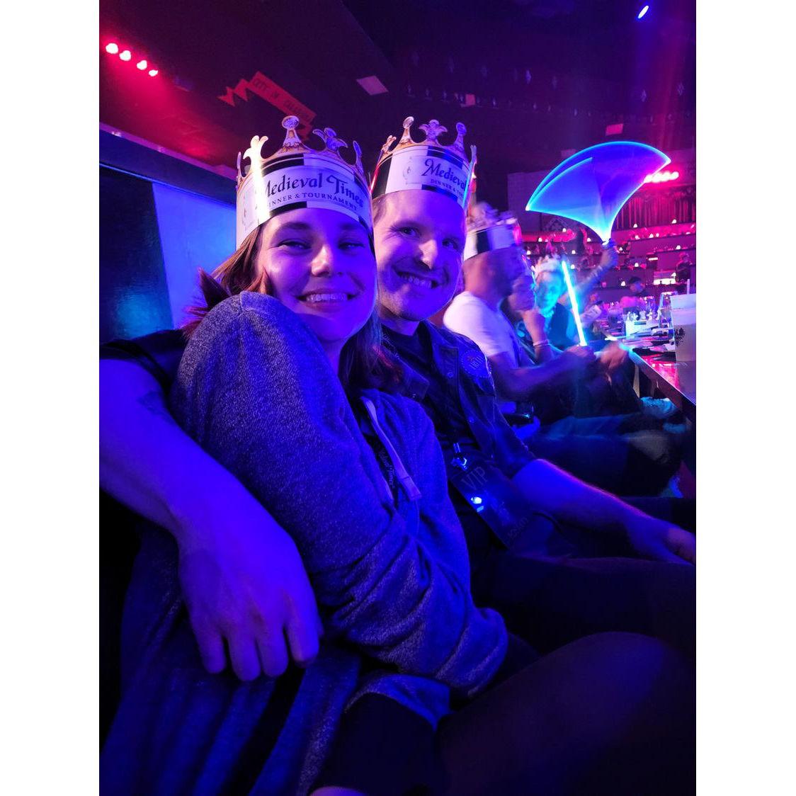 Honored guests at a feast and tournament.