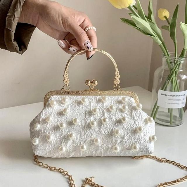 Classic vintage pearl top handle metallic white clutch