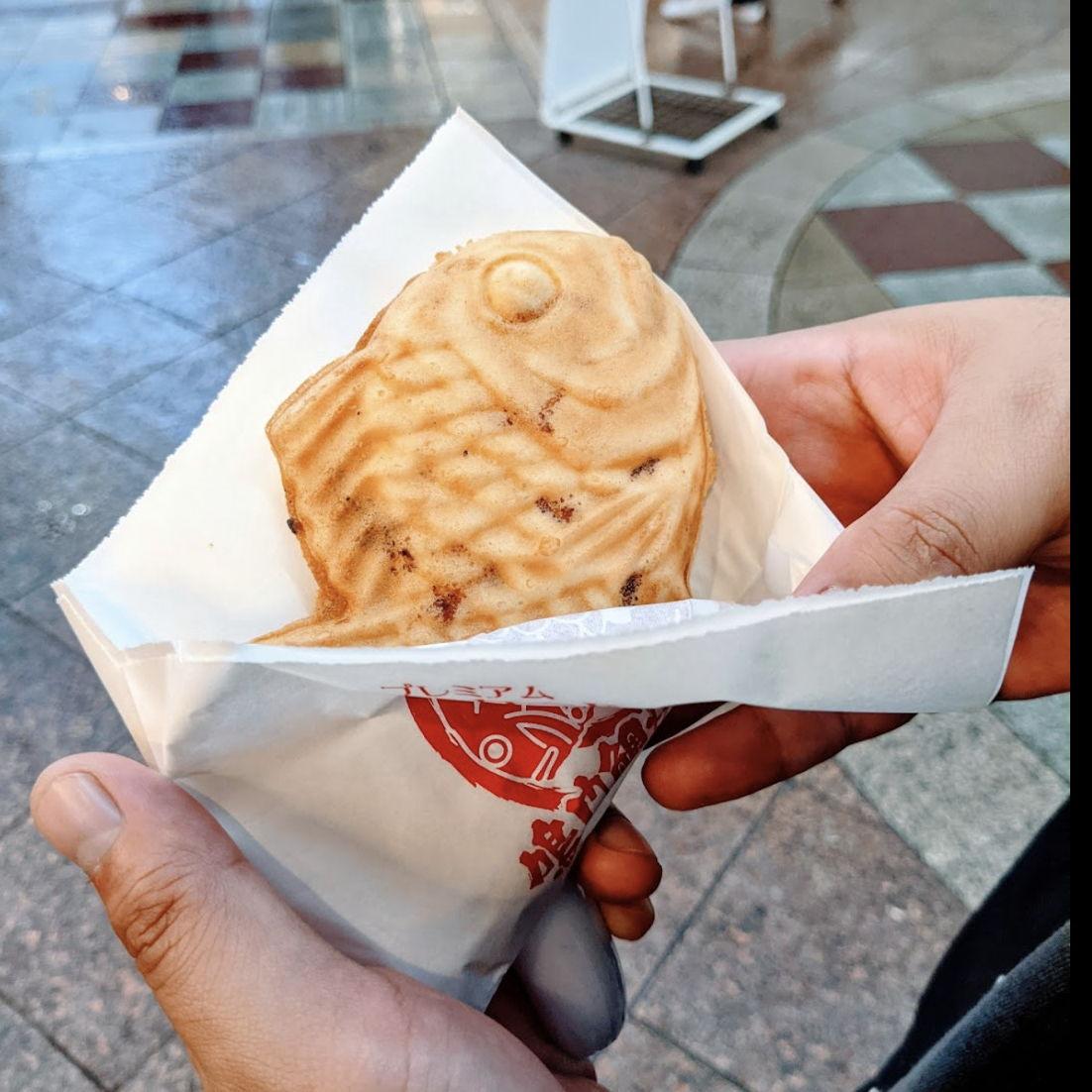 Train station treat-- taiyaki, a fish-shaped pastry often filled with custard, bean paste, or something savory like ham and cheese.