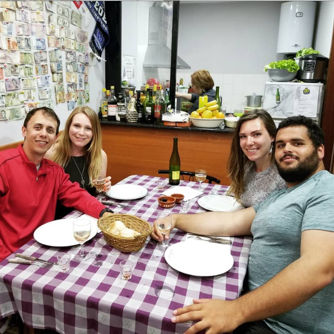 Enjoying an authentic Portuguese meal in Porto, Portugal with Carolyn's sister, Jessica, and her boyfriend, Beau