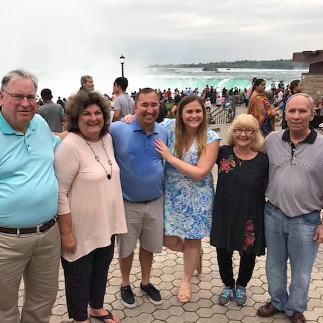 With both sets of parents right after we got engaged, on both of their wedding anniversaries!
