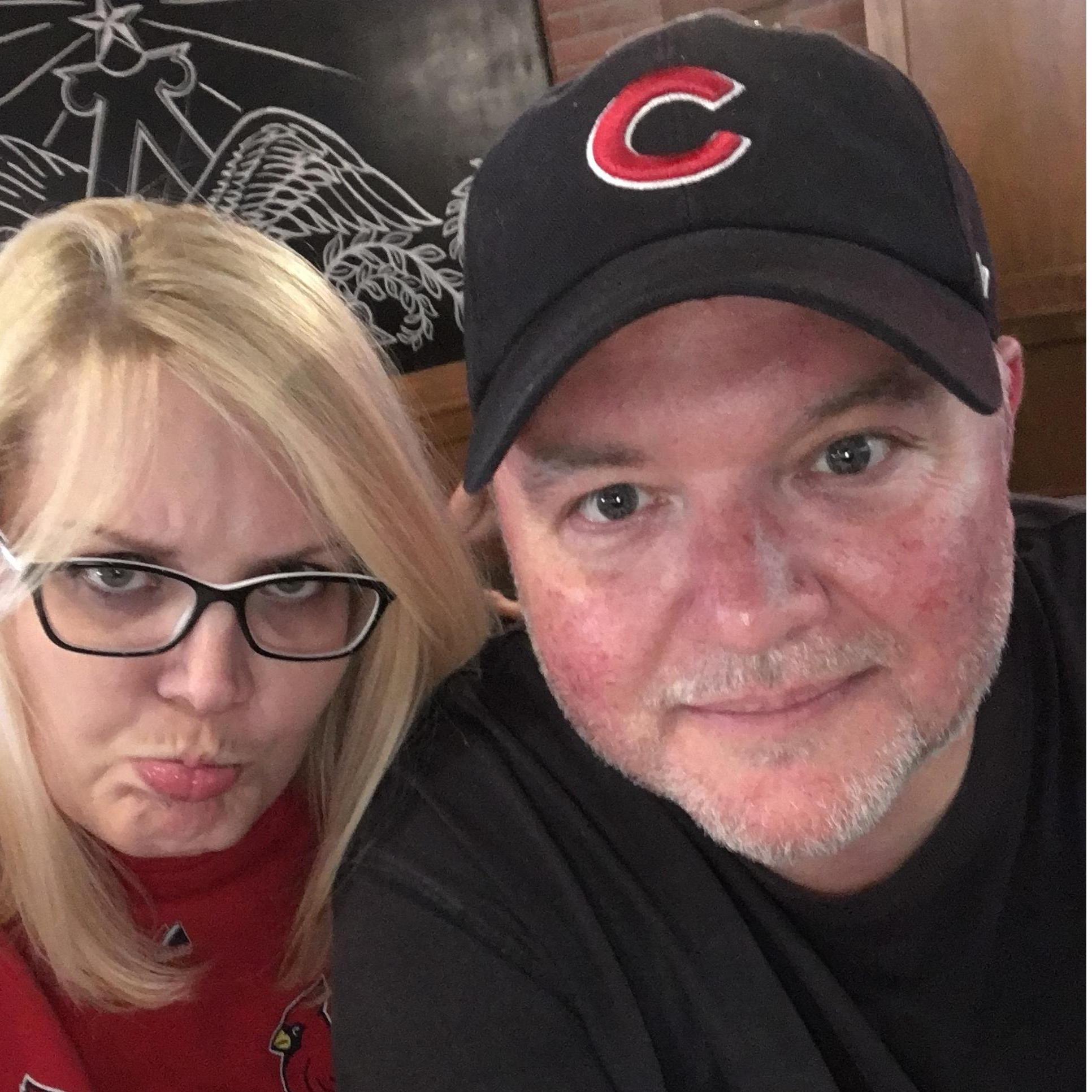 Our first Cubs Cards game at Busch...Lindsey was mocking the Cubs hat.