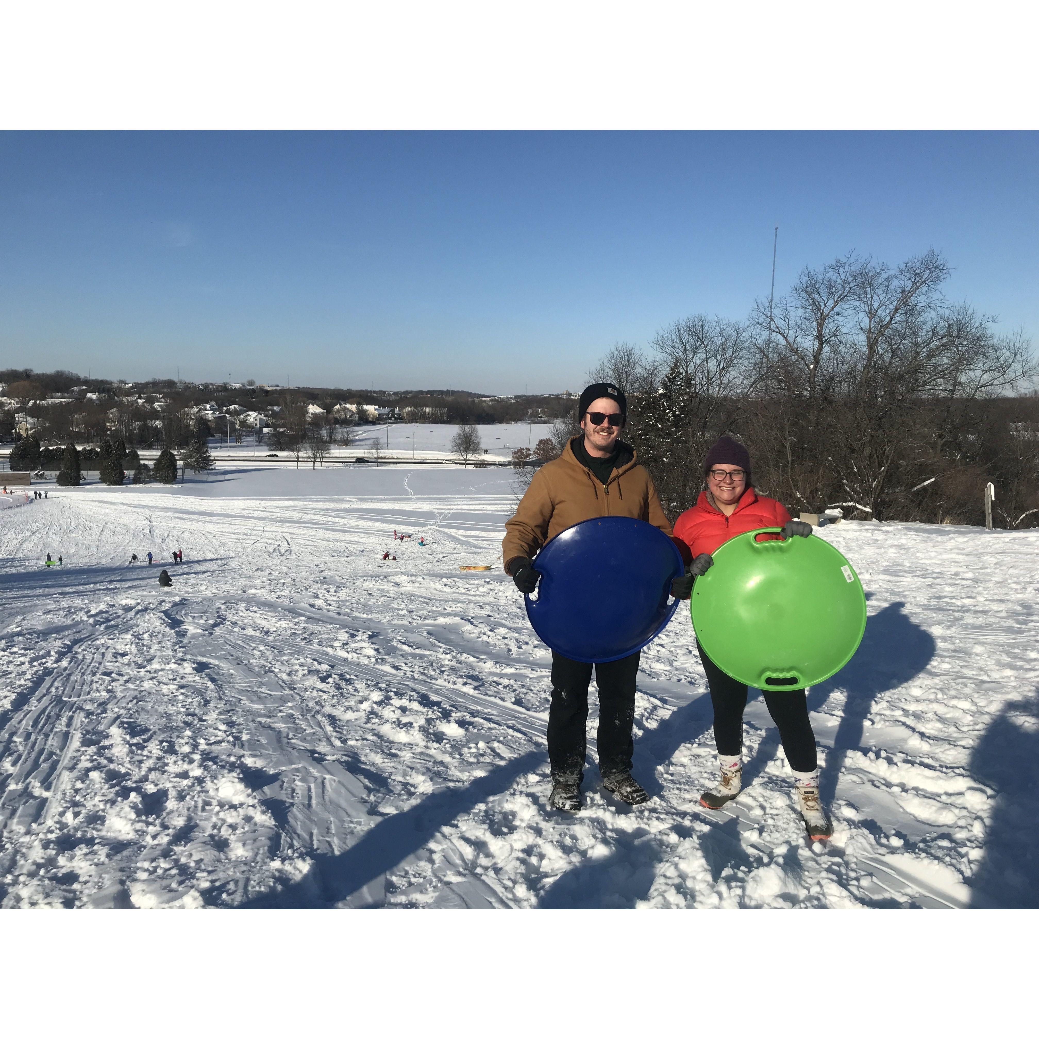 Embracing our inner child (right before the sled broke) in Madison, WI