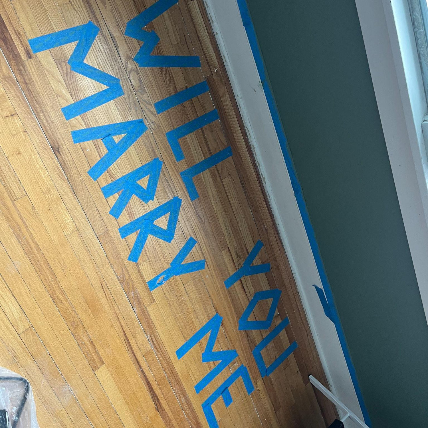 Andrew proposed on Marissa's birthday during one of many house projects