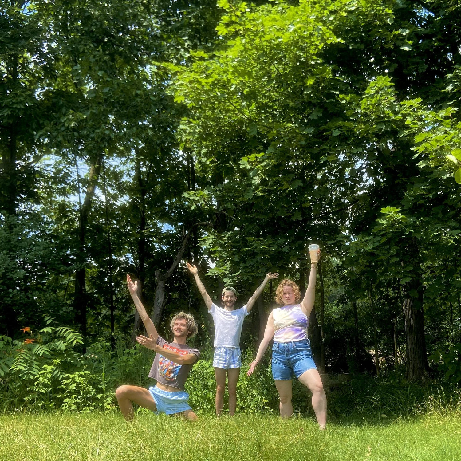 The couple & Alyssa celebrating Zack's birthday in the backyard, July 2023.