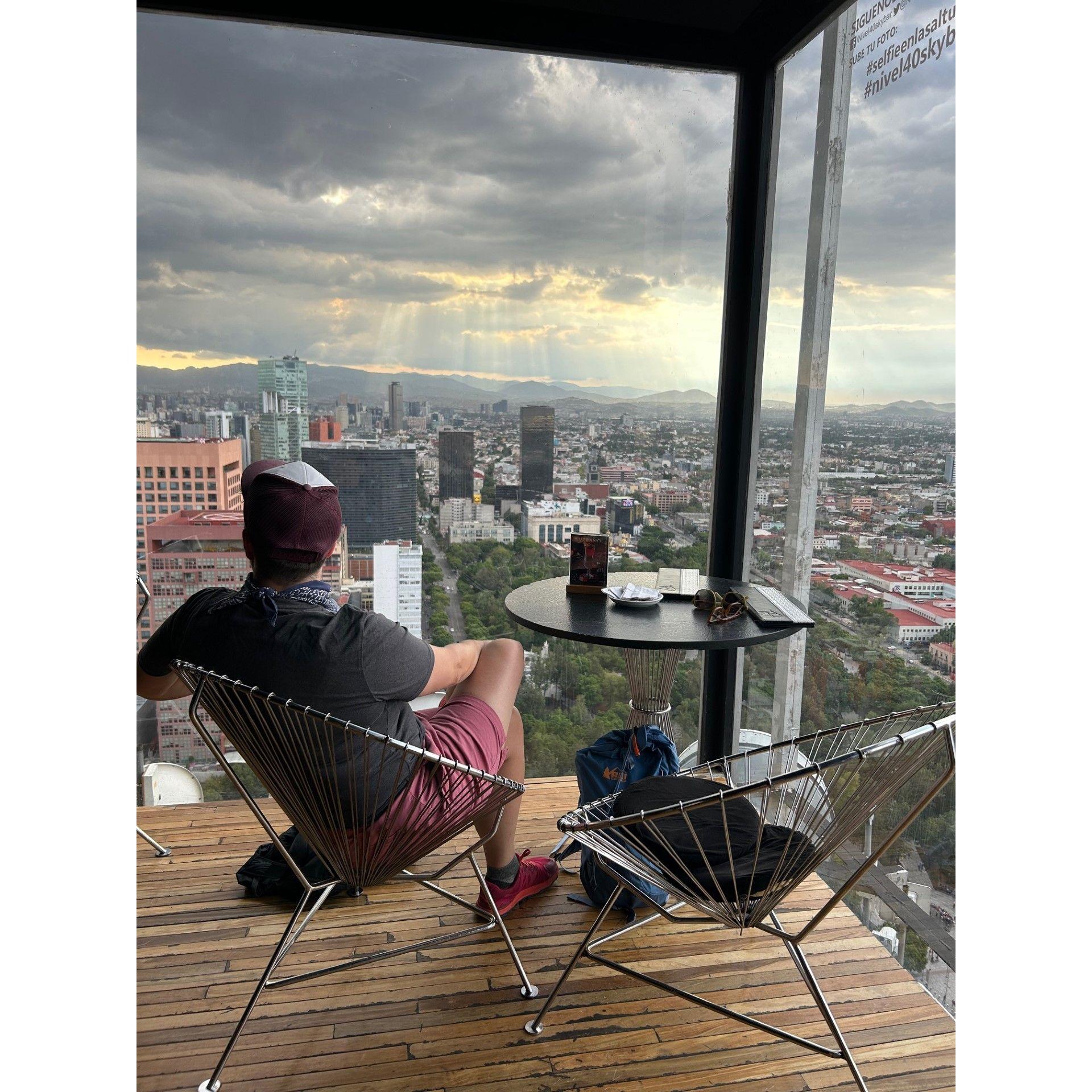 Watching a storm roll in over Mexico City from the most amazing vantage point.