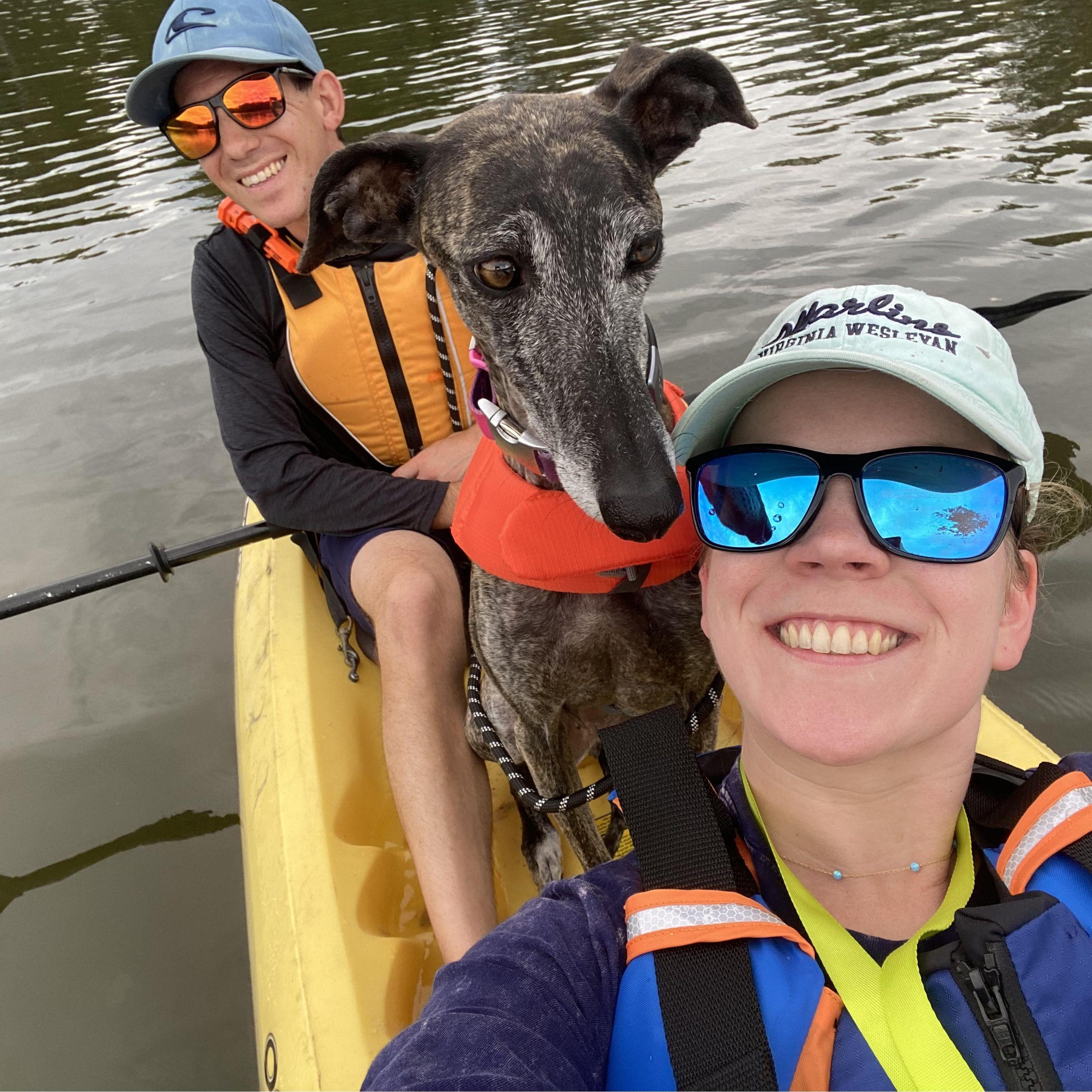 Boni's first time going for a ride in a kayak during a camping trip