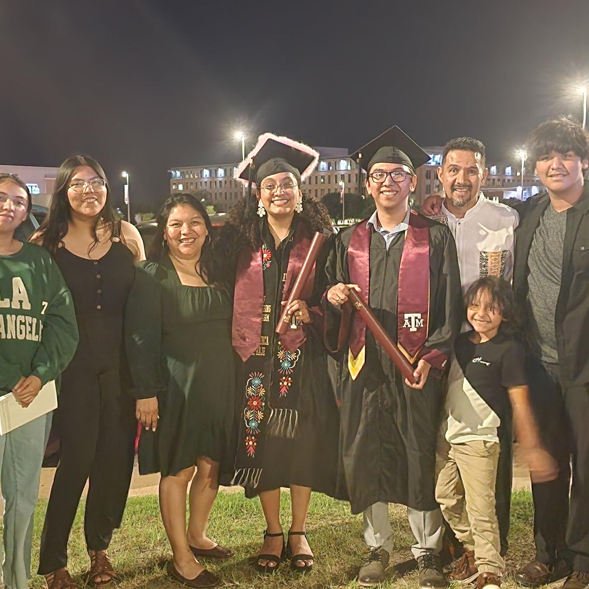 Undergraduate graduation with Alain's Family