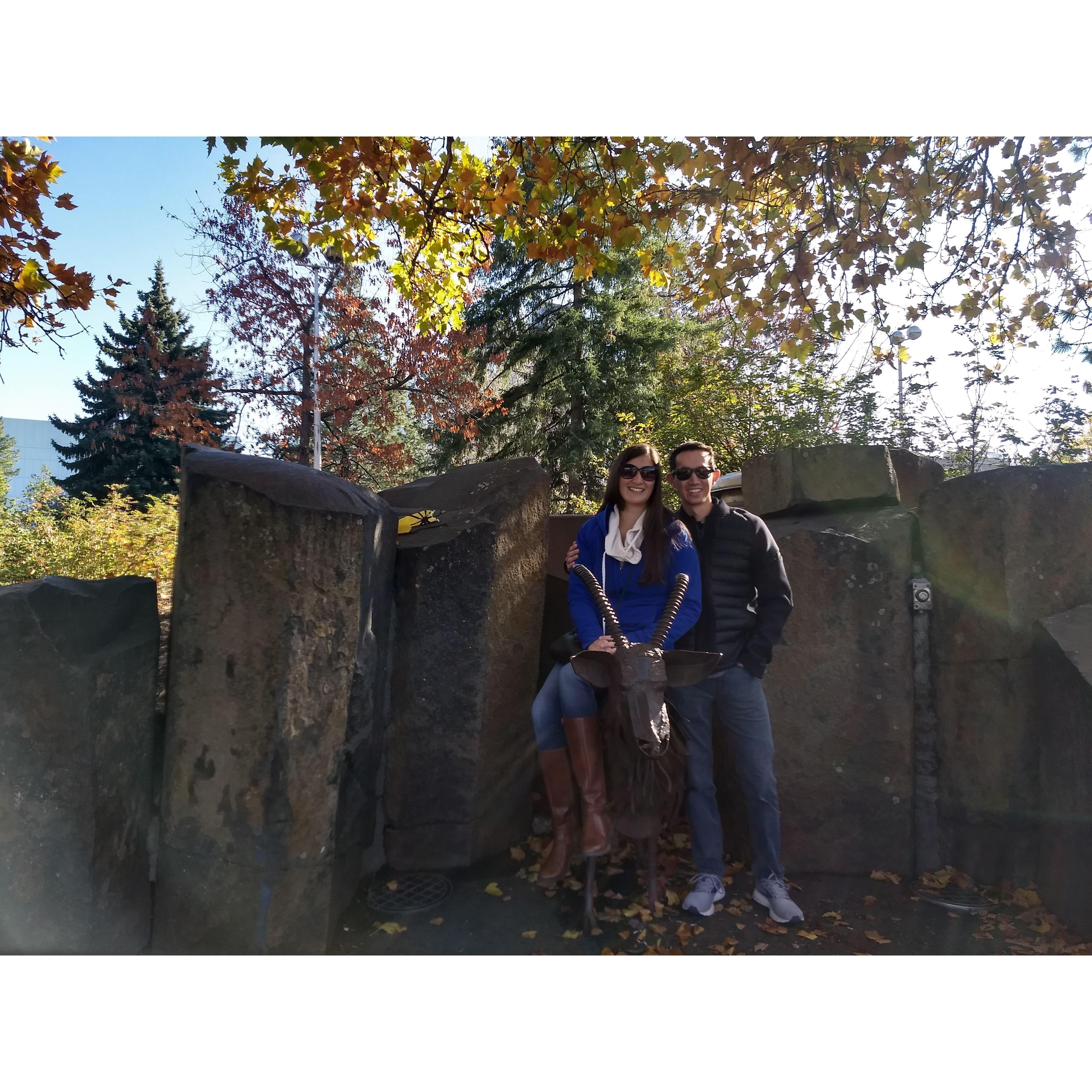 Picture taken with the garbage eating goat in Riverfront Park a few minutes before getting engaged!