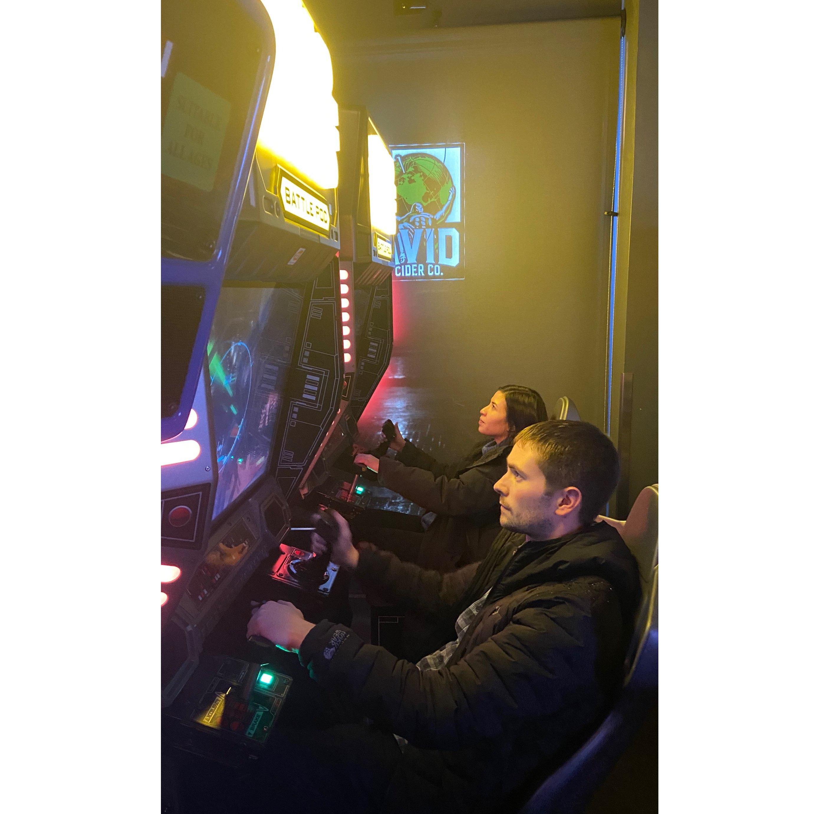 Working as a team (or, more accurately, failing as a team because those Star Wars arcade games are hard), Jan 2020.