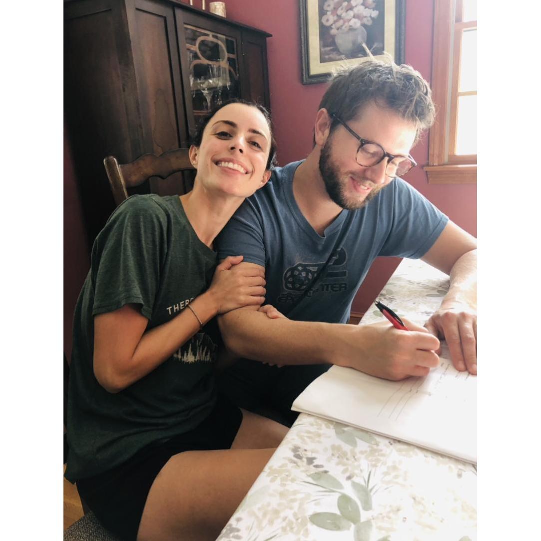 Signing the contract for our venue right after we set our date!