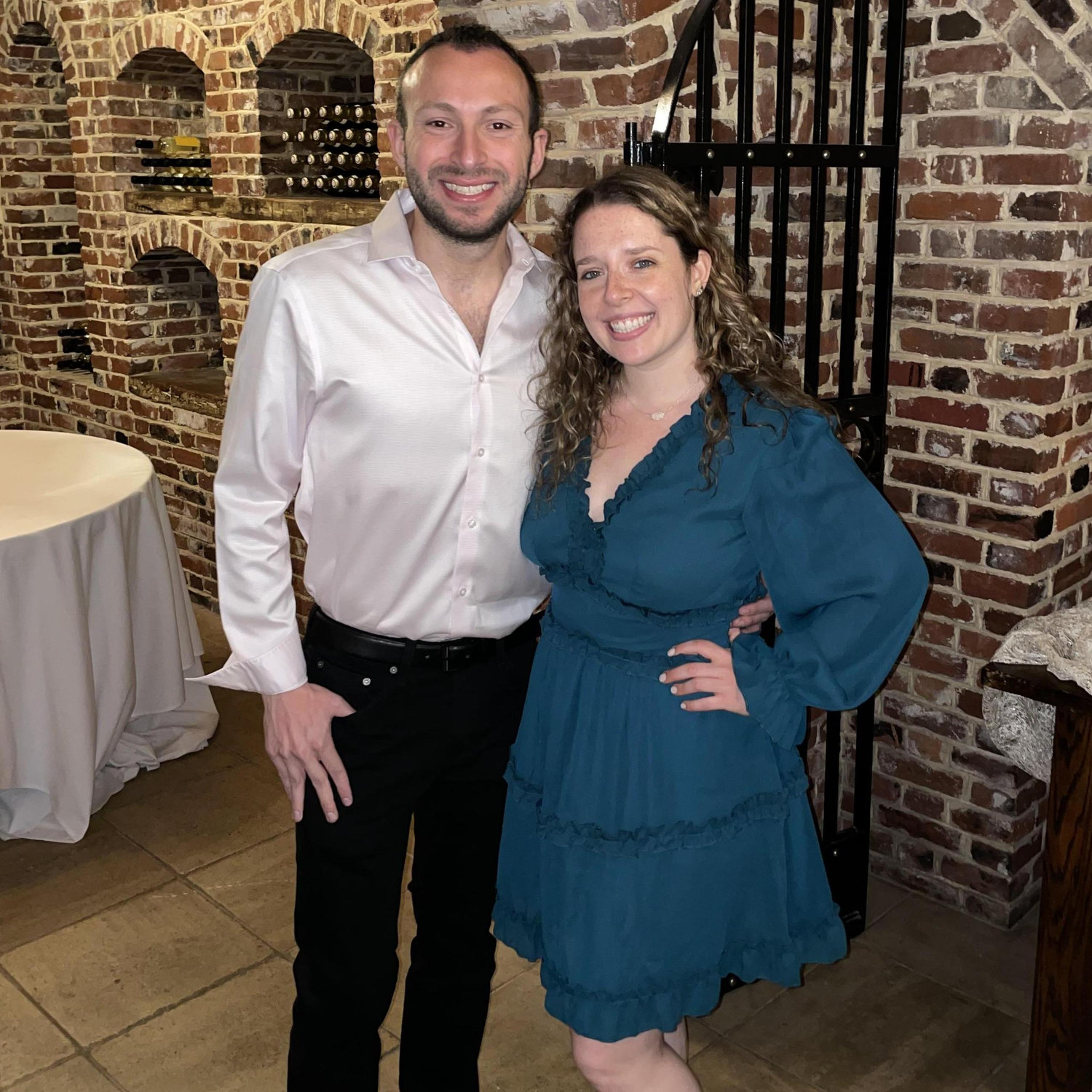 At Lisa/ Dylan's rehearsal dinner in May, 2021. Corey had the ring and proposal plan, but Tara had no idea!