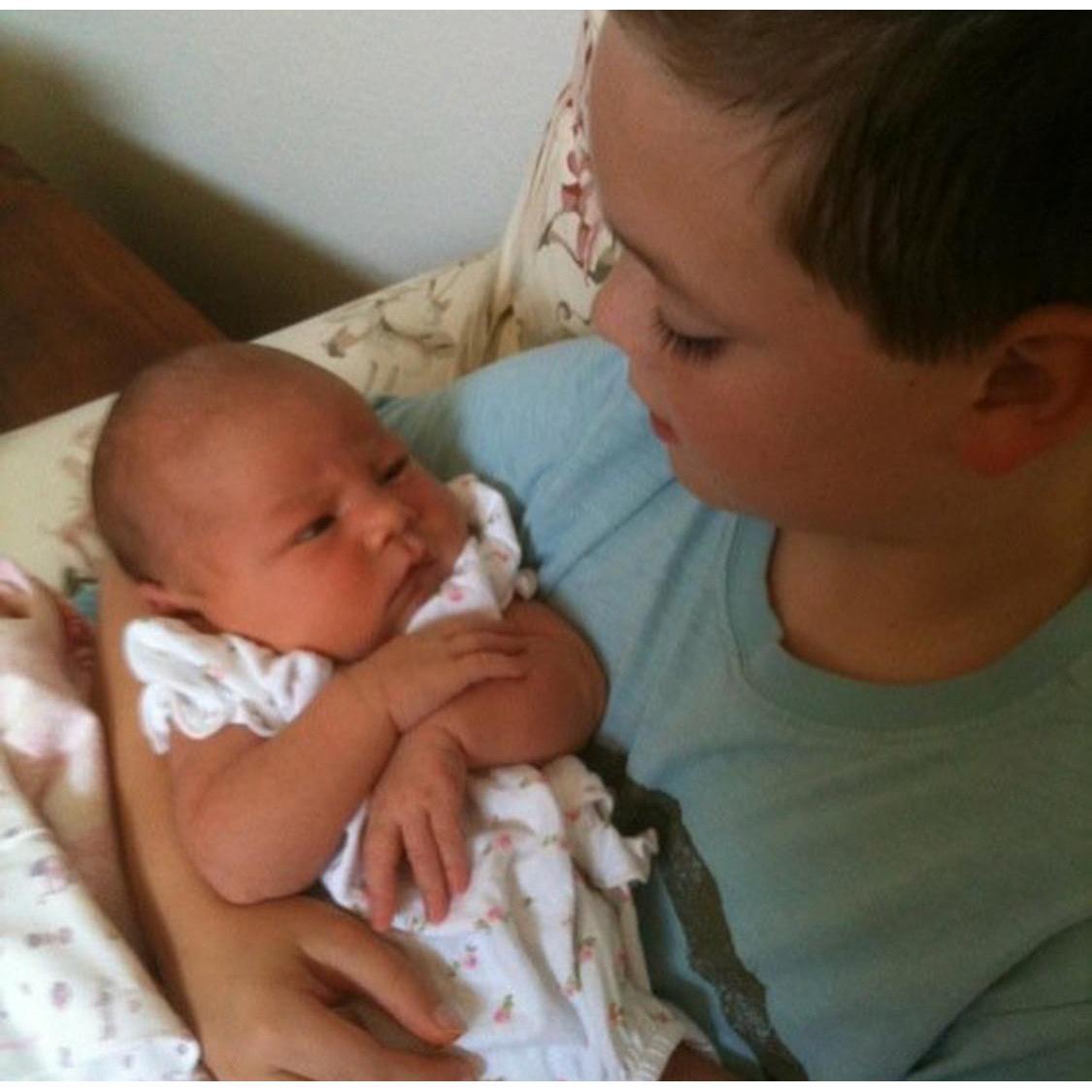 Zach Holding Baby Reese