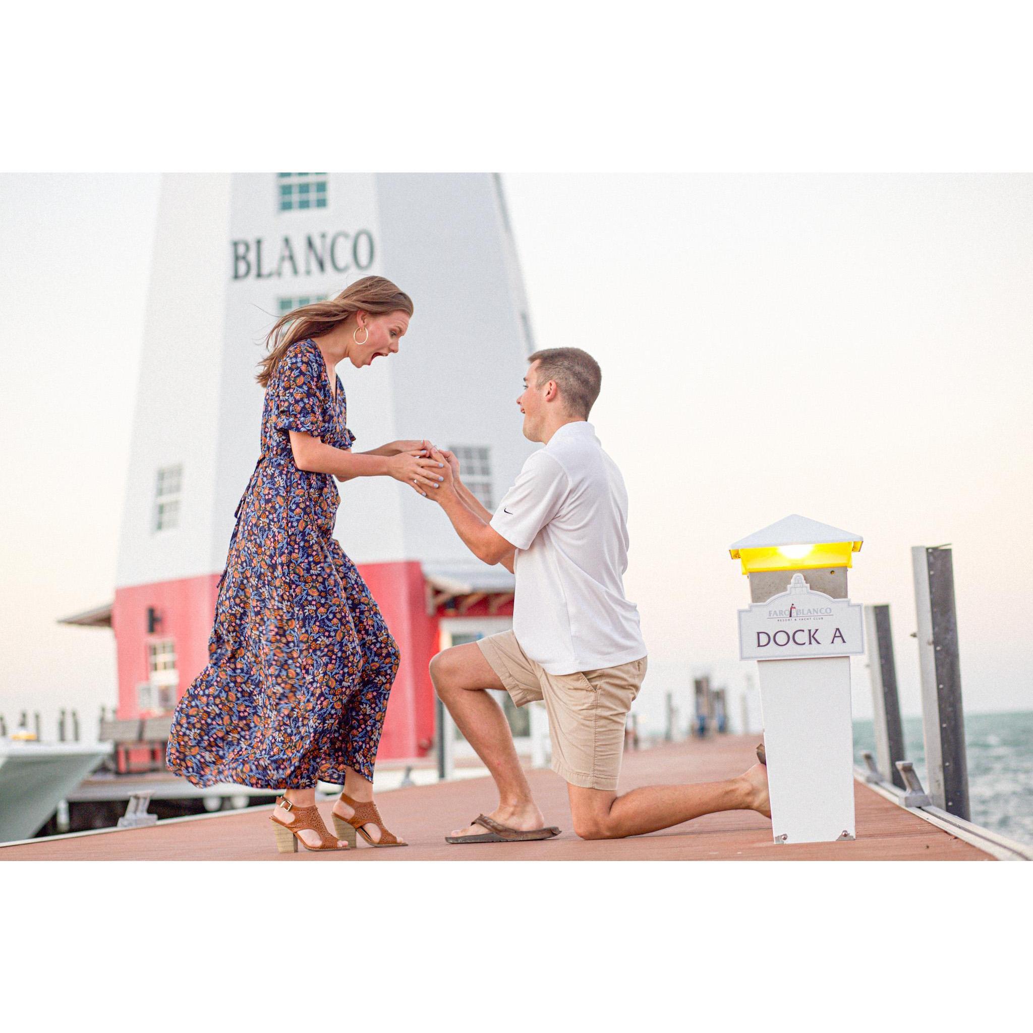 A fake proposal... I hope the people watching thought it was real. Also, please notice Cam's face.