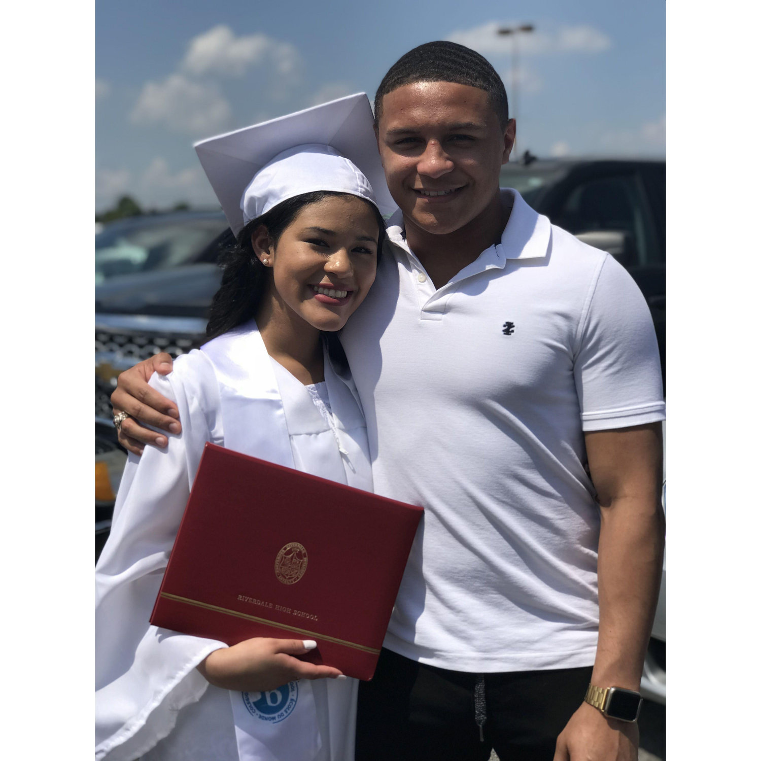 Our first photo together at my High school graduation. We weren't dating yetttt