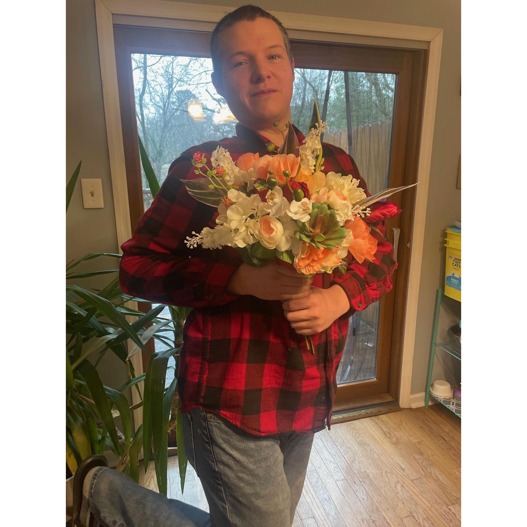 Ben helping model the flowers for the wedding.