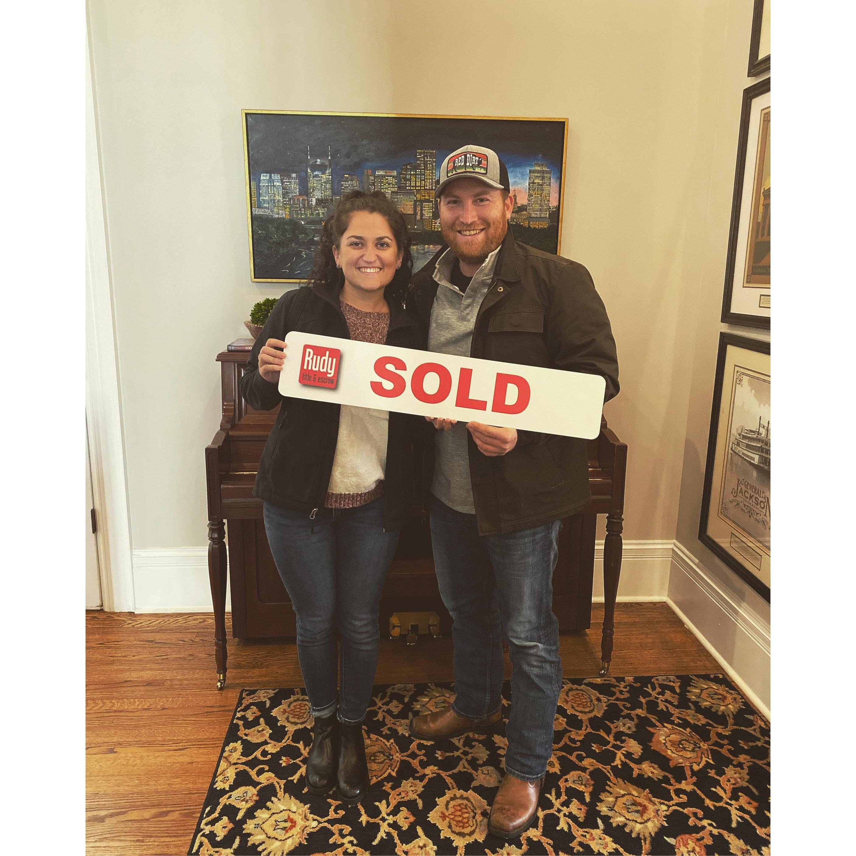 Closing on their first house together in Tennessee!