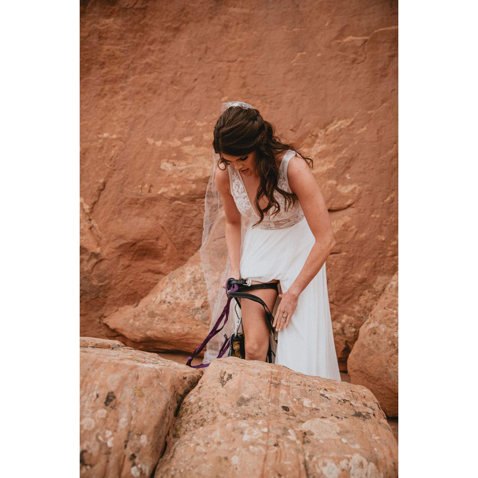 The final step of any brides preparation: harnessing up.
