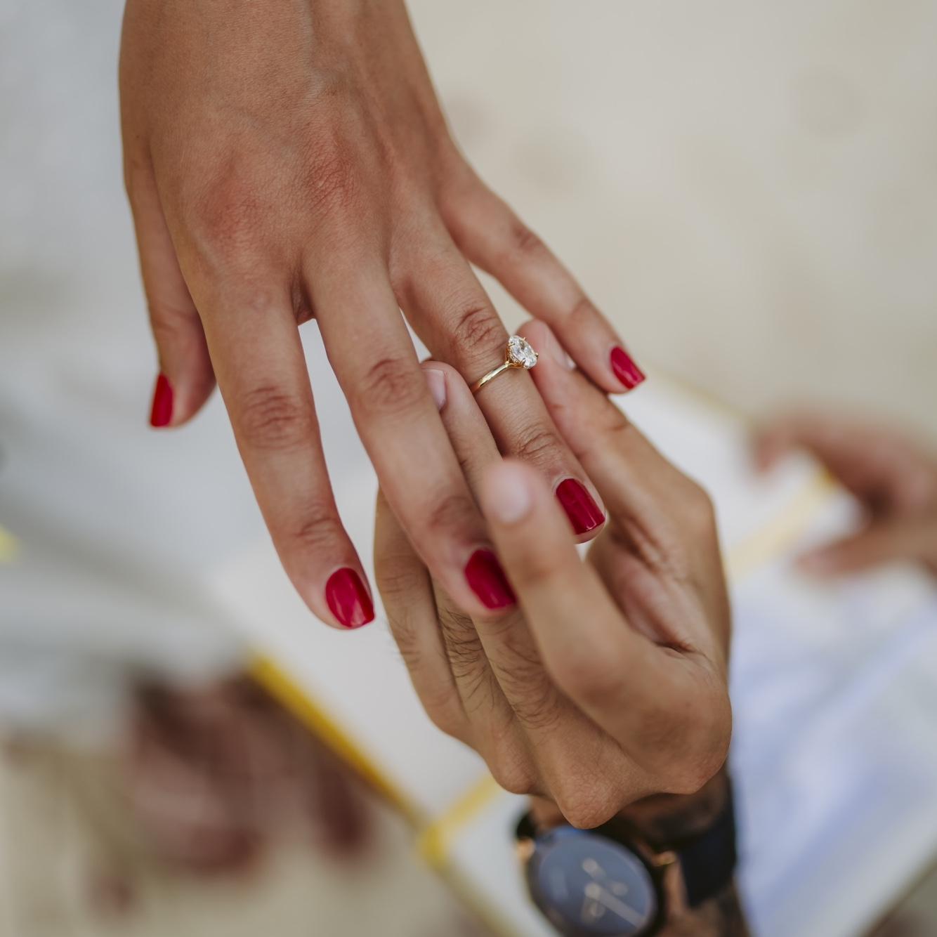 Fun fact: Raisa had always wanted to get engaged with red nail polish and Jony made it happen! The day of the proposal, he booked a spa day for them both to get mani-pedis.