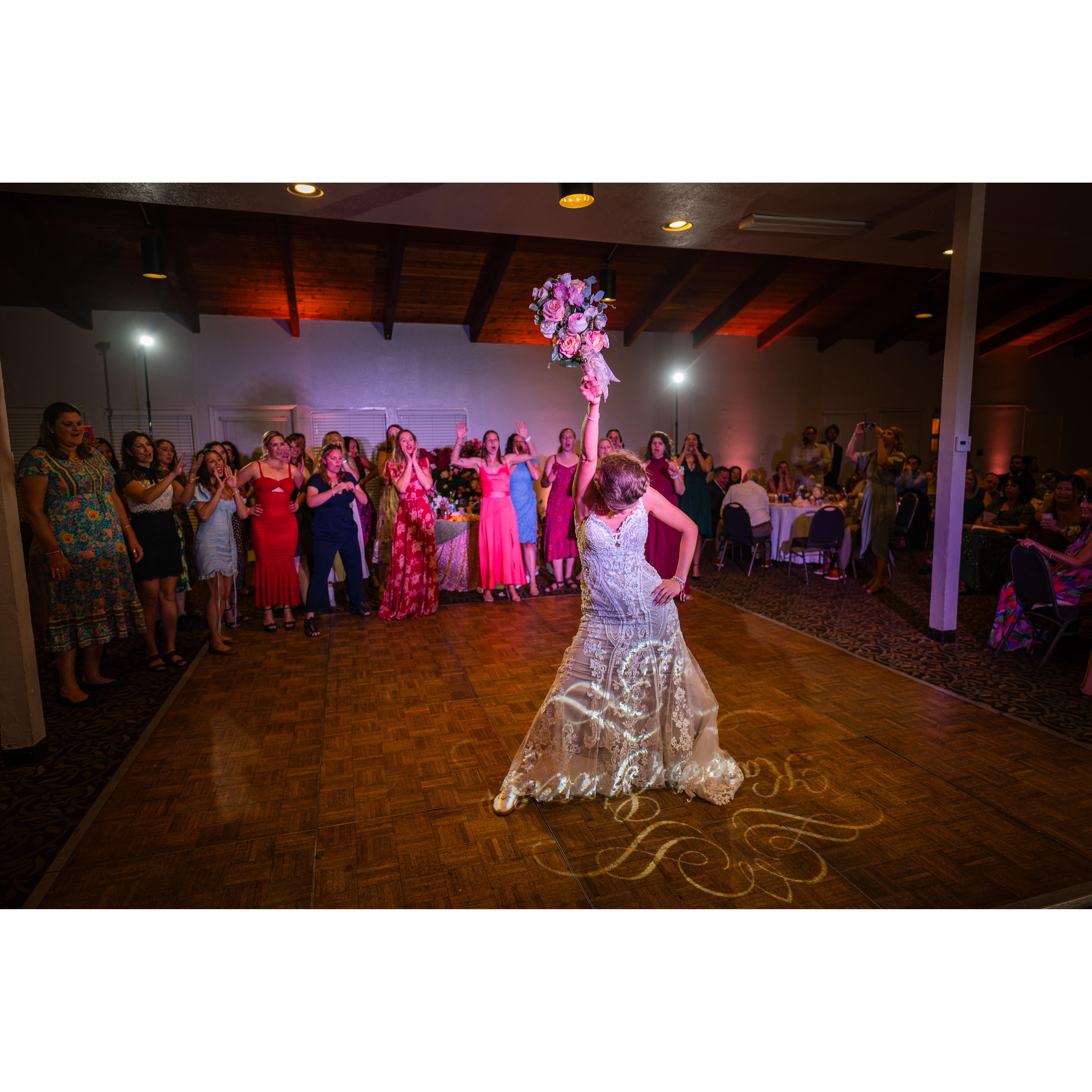 Katie being very Katie during her bouquet toss.