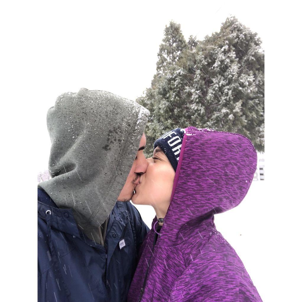 Kisses in the snow! This was my first time seeing snow fall from the sky!