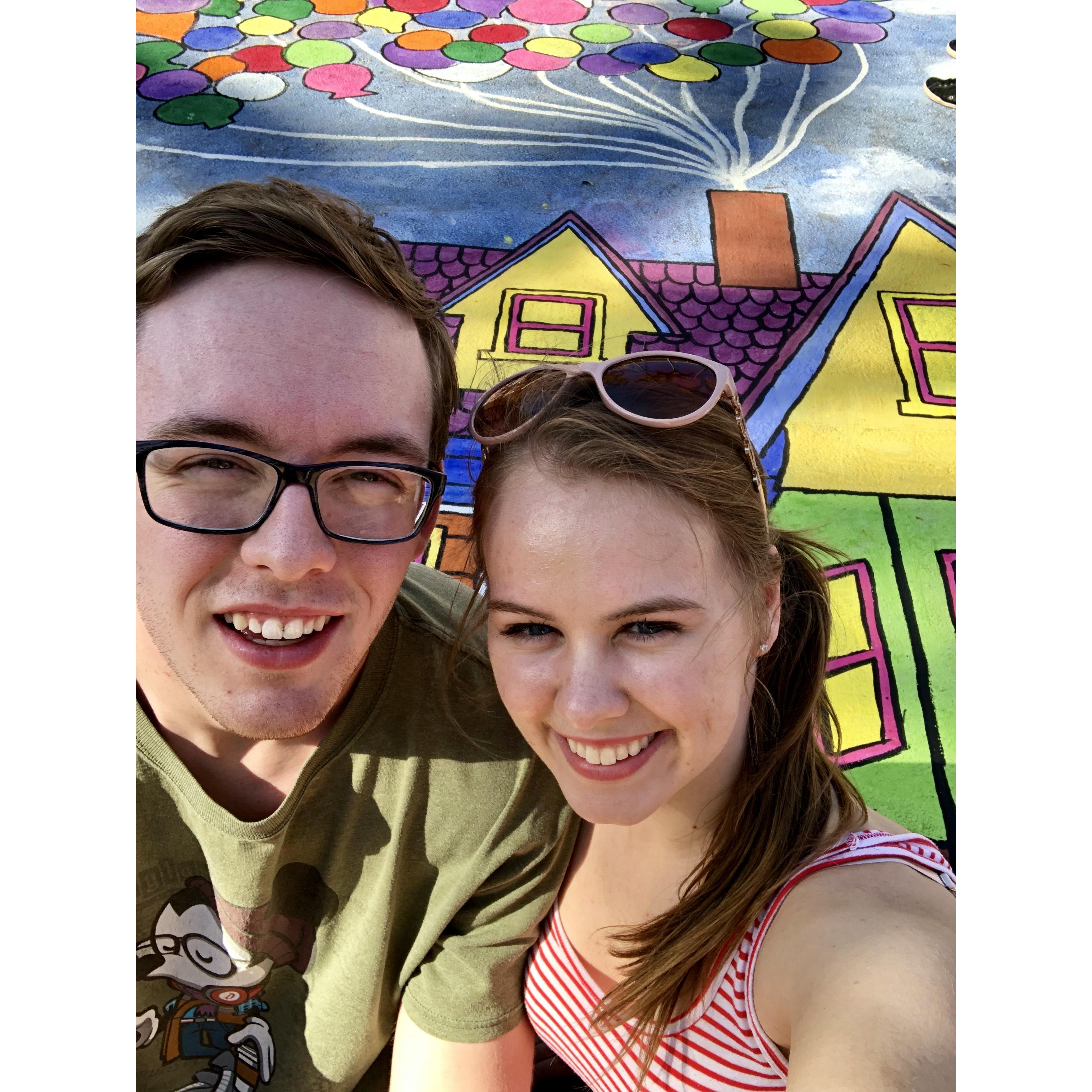 03 . 09 . 19
Posing in front of Carl's house from UP at 5th Ave.'s sidewalk painting.